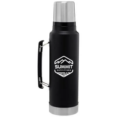 Large Stanley classic bottle shown upright with handle and cap visible.