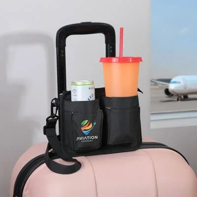 Travel caddy fitted over a luggage handle with two drink holders visible.