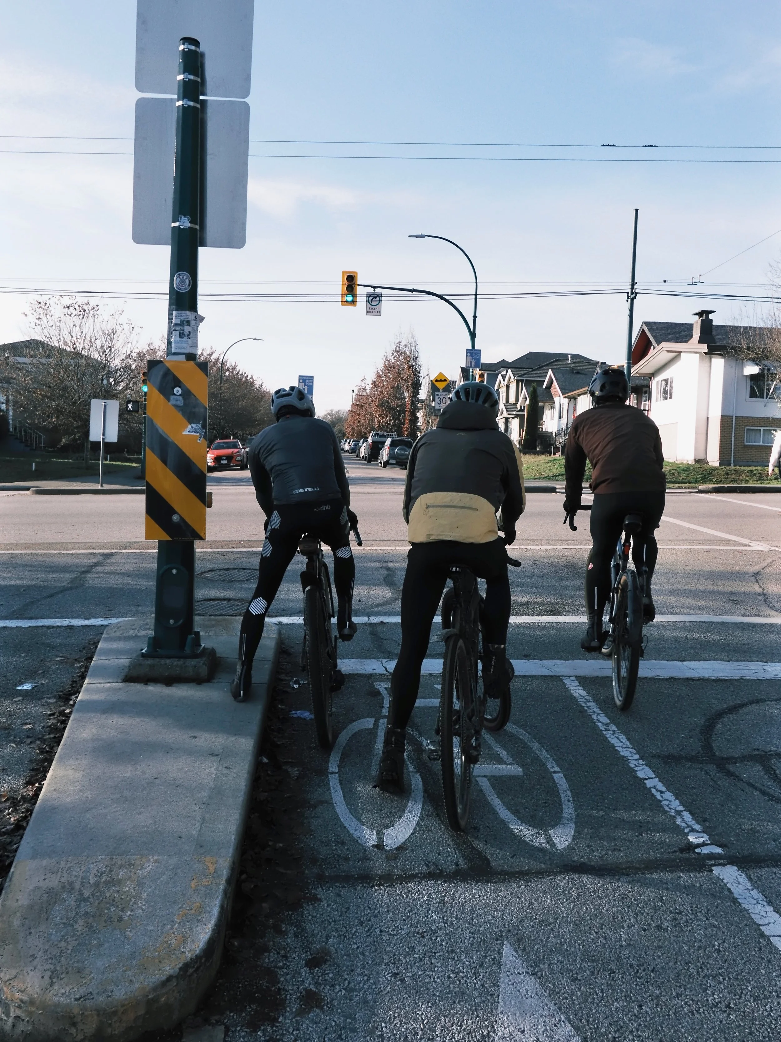 Three roadies at a light