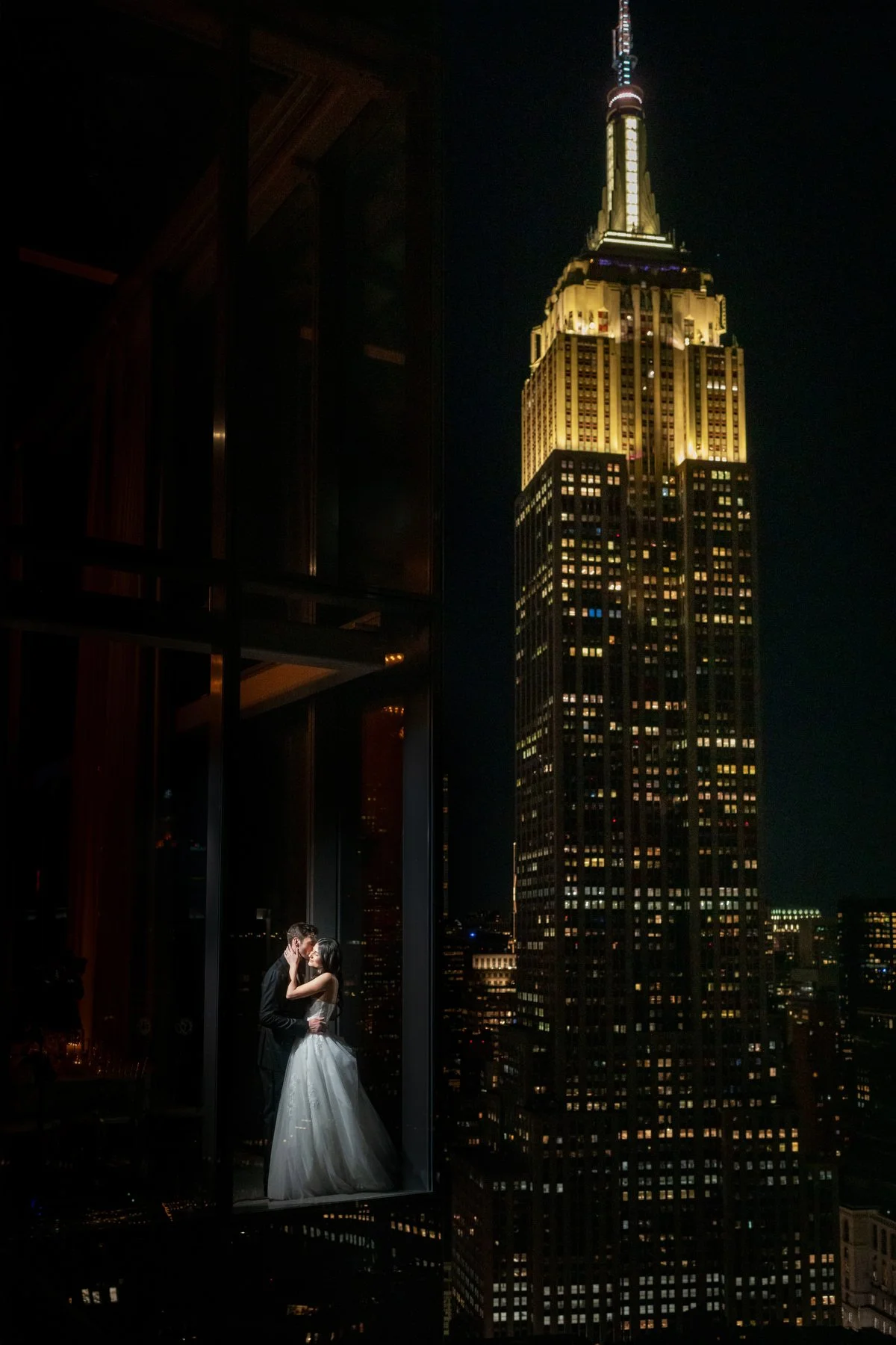 Couple portrait with Empire State Building at night Virgin Hotels NYC wedding