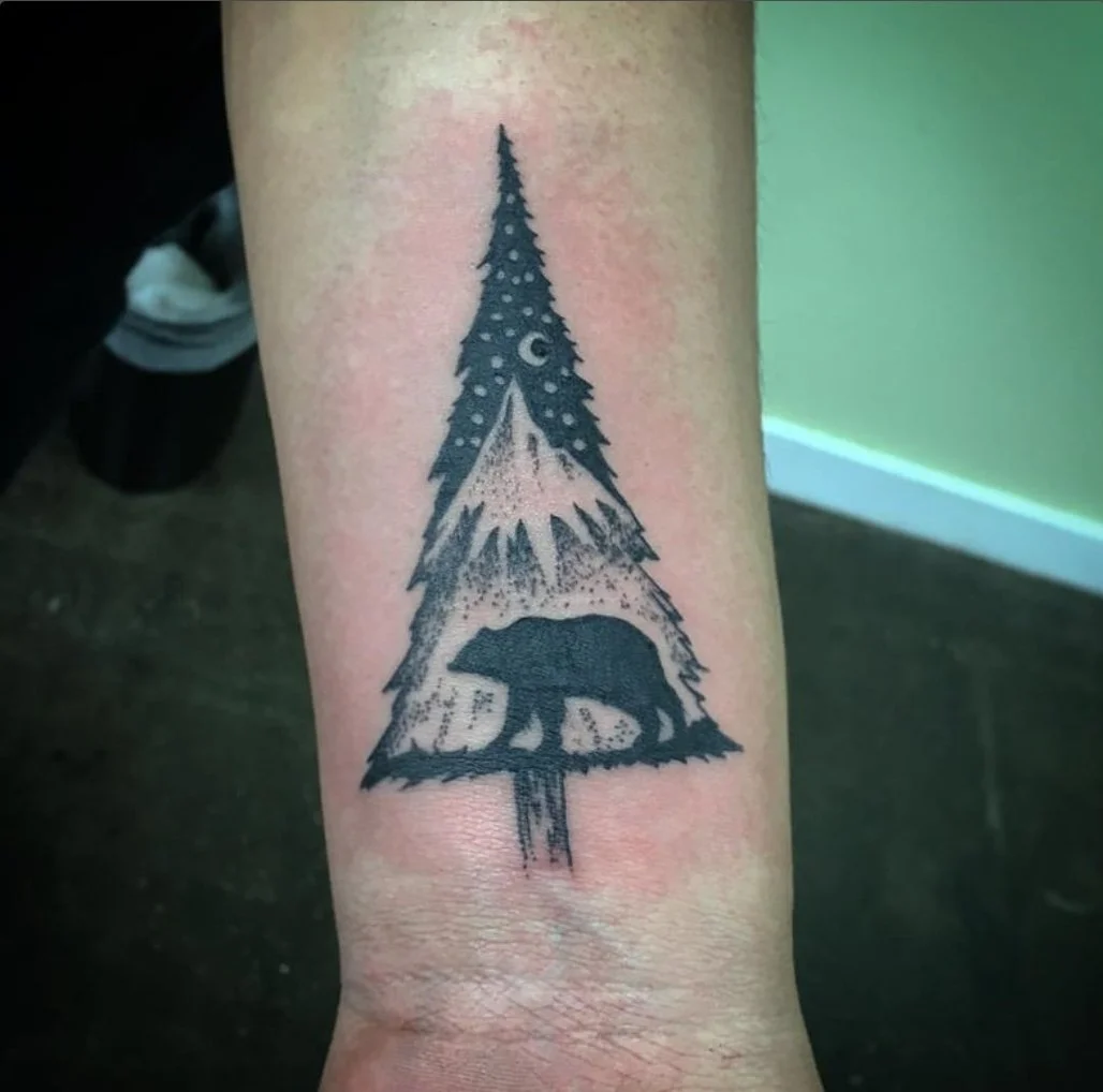 walkins_huntington_beach_tattoo_forearm_arm_black_bear_silhouette_tree_mountain.jpg