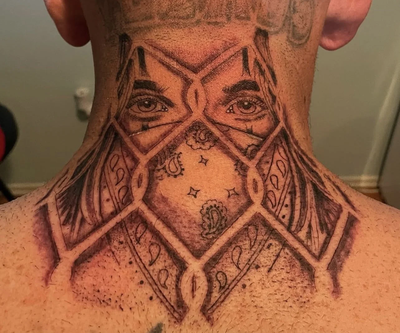 jake-kappel-tattoo-huntington-beach-chain-chainlink-neck-black-and-grey-gray-tat-eyes.jpg