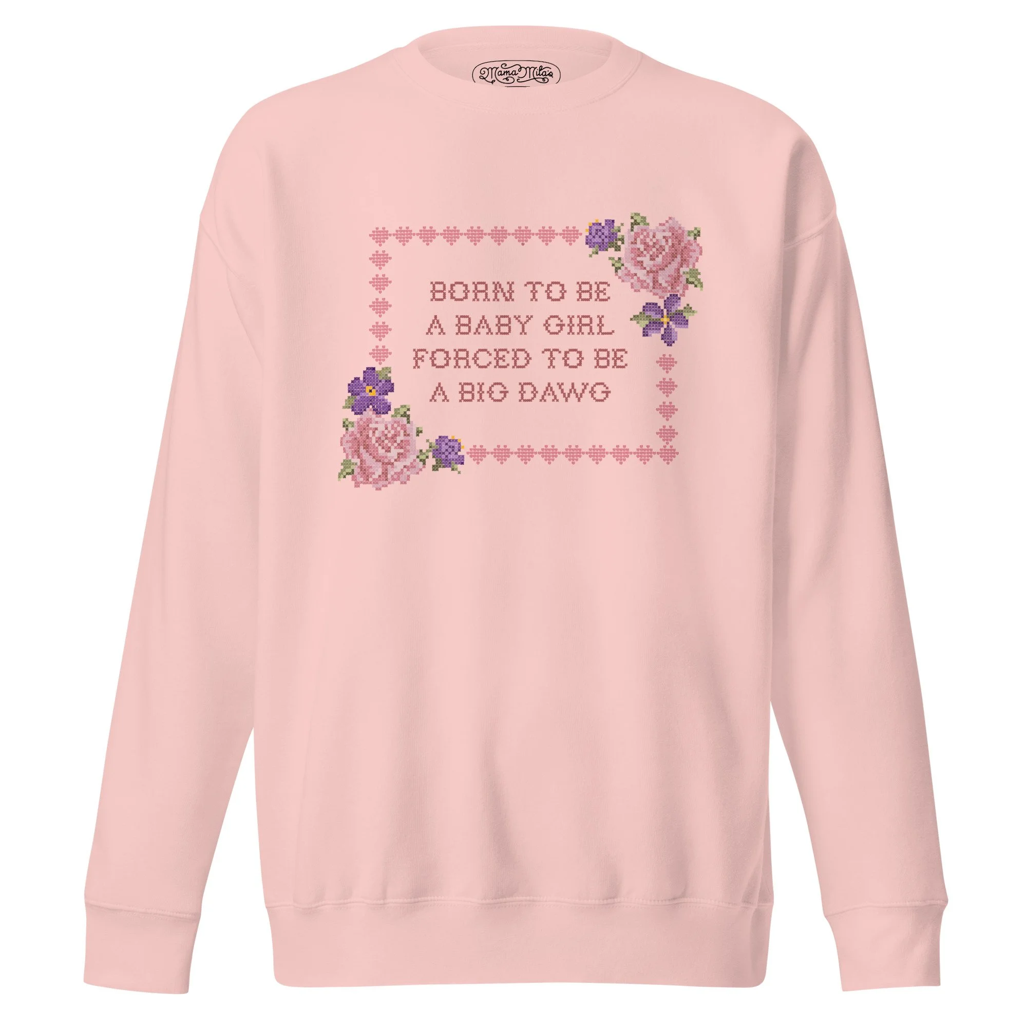 Pink sweatshirt with an cross stitched vintage floral emblem that says "Born to be a baby girl, forced to be a big dawg" in the middle.