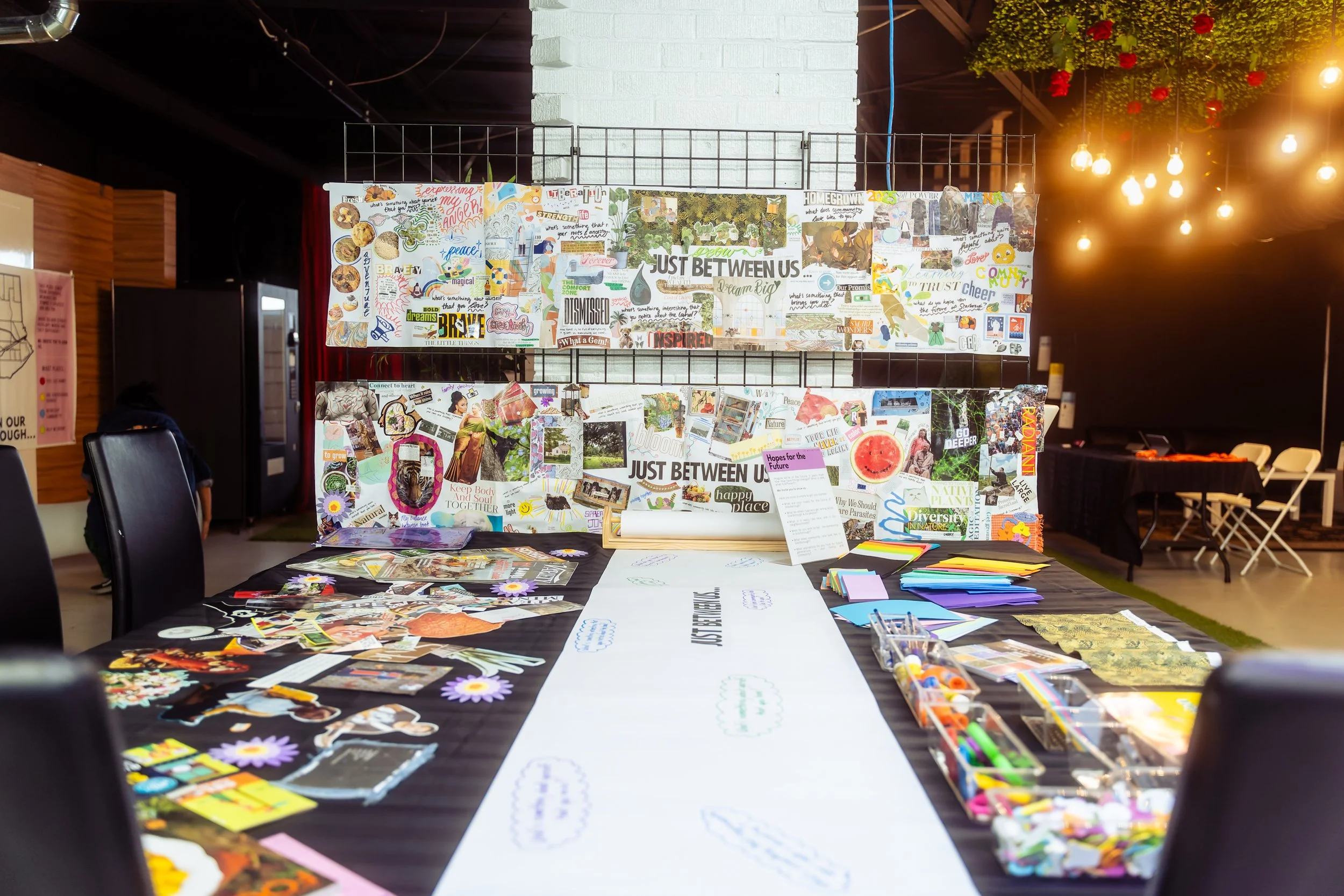 A overview photo of table full of prompts such as hope for the future and some chairs around the table. 