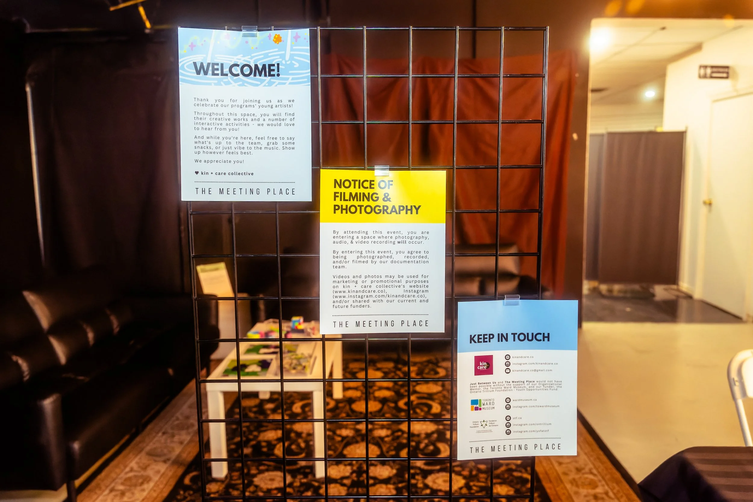 photograph of welcome banner and some reminders about filming and photography and how to keep in touch with kin and care. 