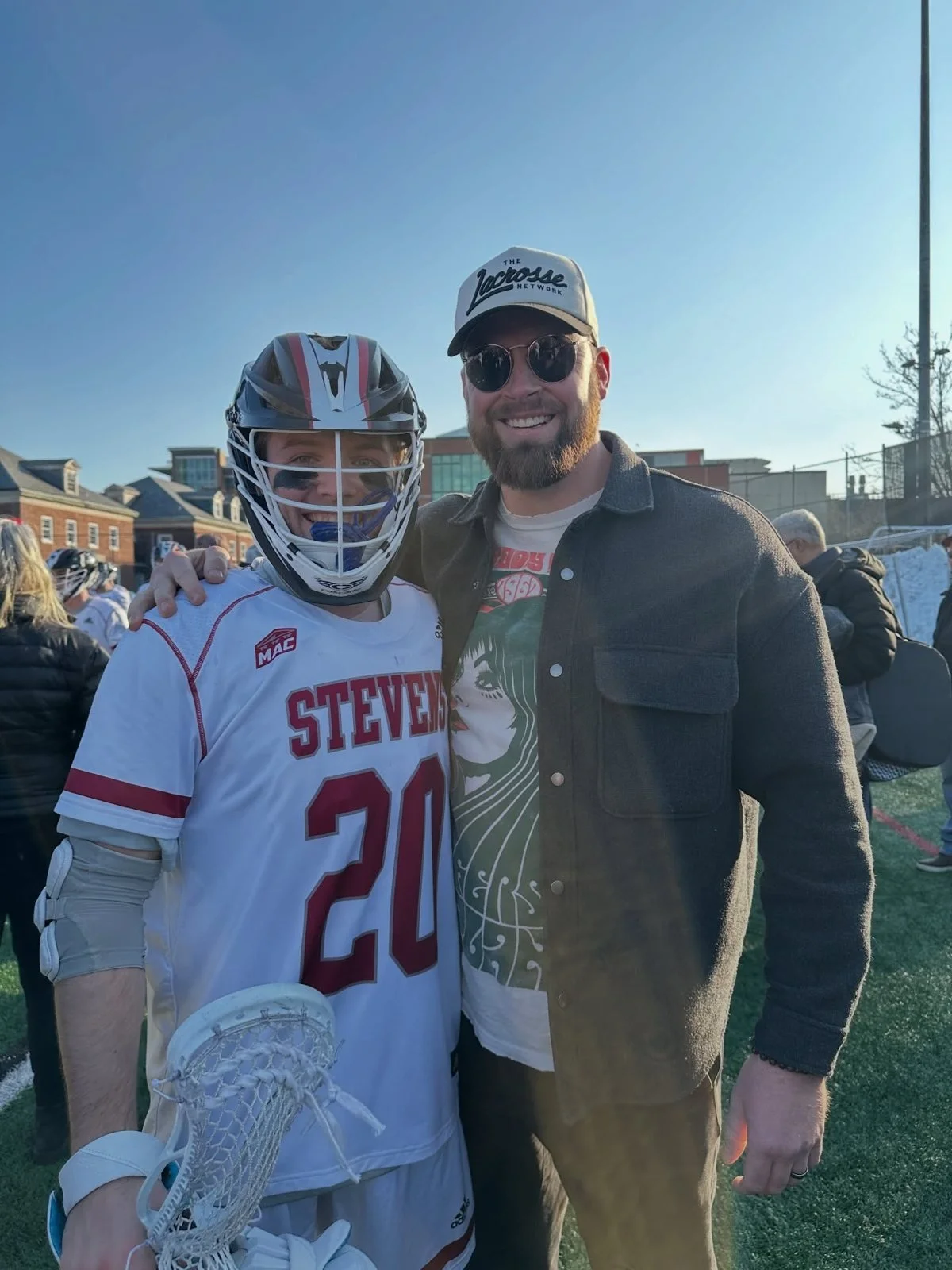 Stevens men's lacrosse player with a Char coach after a win, Char Sports Performance Montclair NJ