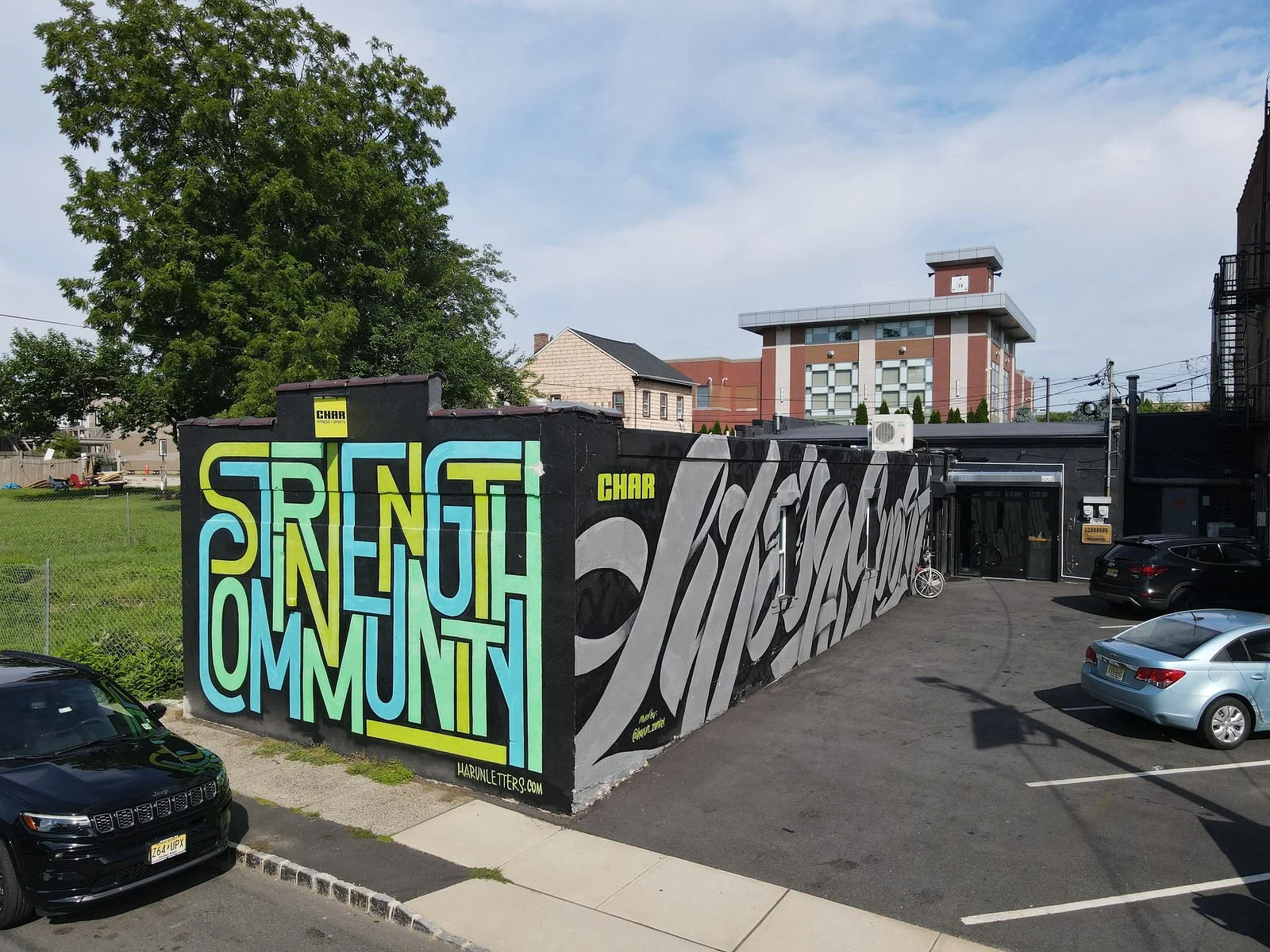 Strength Community mural outside Char Sports Performance in Montclair, NJ