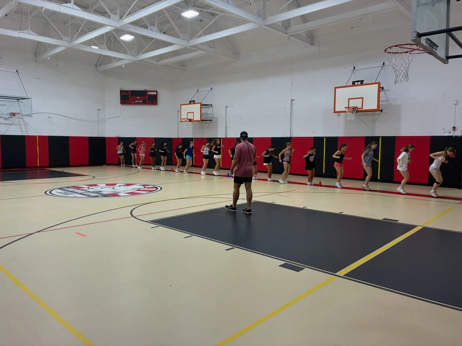 Coaches leading a team speed and agility session at Char Sports Performance in Montclair, NJ