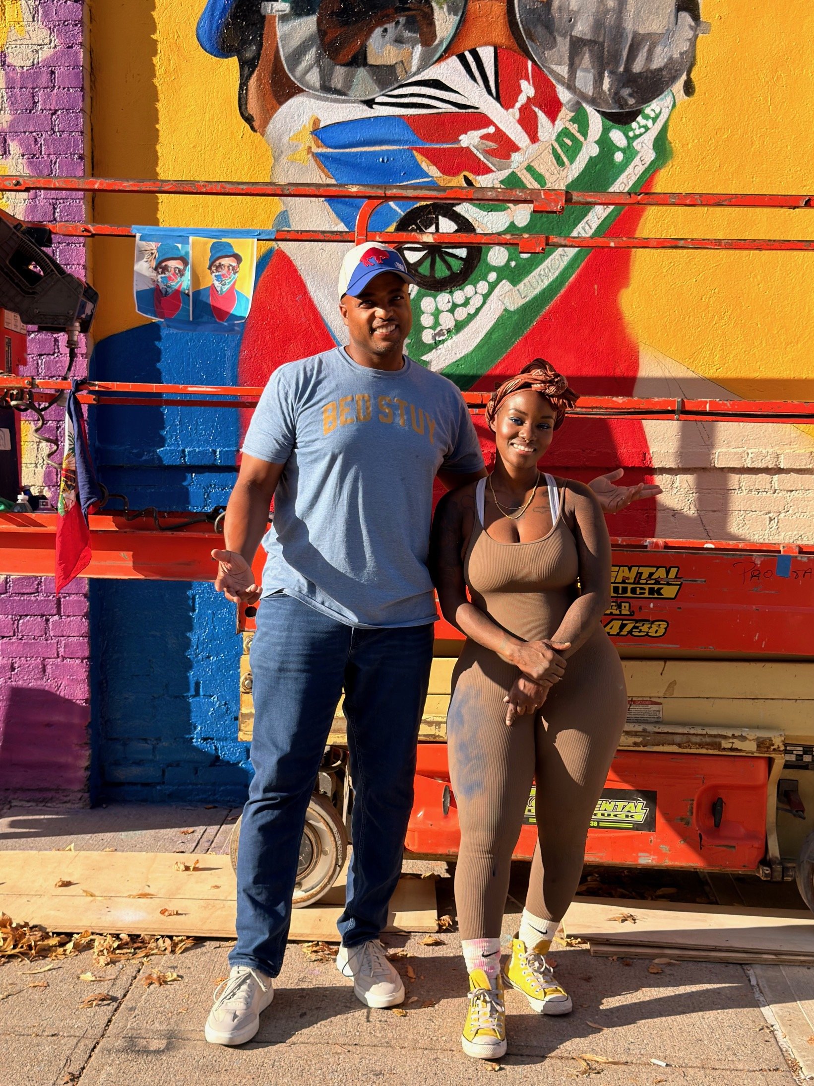 Ingrid Yuzly Mathurin with a friend at Bed-Stuy Walls 2026, 677 Lexington Ave, Brooklyn, NY.