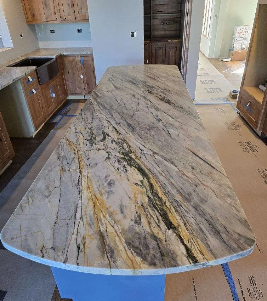 Nothin&rsquo; like some Ijen Blue Honed Quartzite for this lake house🔥🔥🔥 #kitchenrenovation #kitchenremodel #granitecountertops #homeremodelingideas #thehausgraniteco #bathroomremodeling #bathroomrenovation