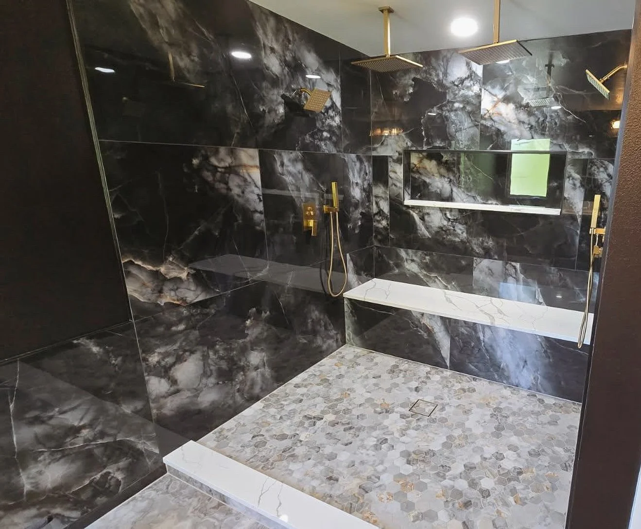 Got to put the finishing touches on this shower remodel yesterday with some white quartz! Niche Shelf, Bench, Curb &amp; Vanity. Turned out pretty sweet! #bathroomremodel #hausgraniteco #remodeled #quartz #quartzite #granitecountertops #kitchenreno