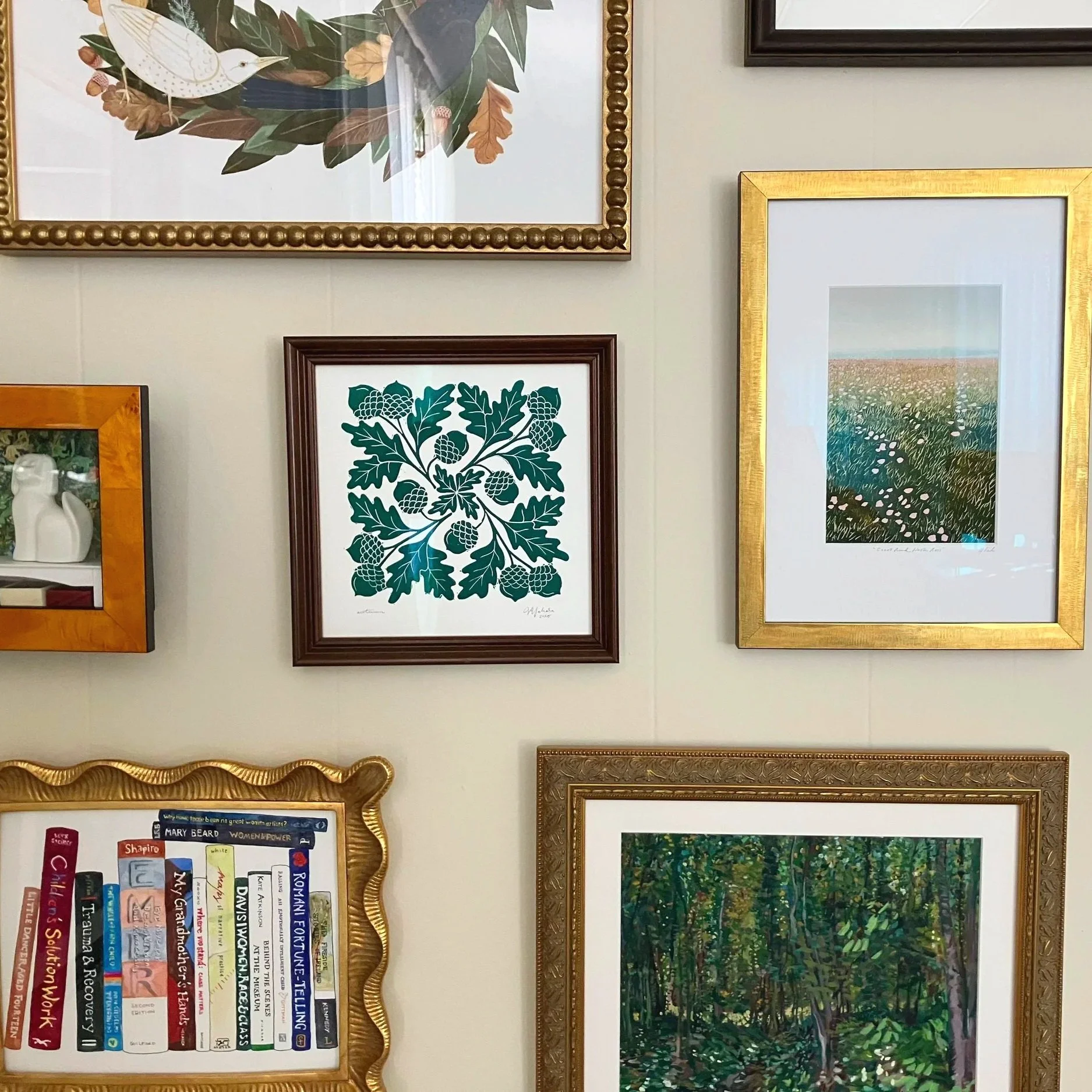 A photo of art featuring birds and oak leaves at Meg Rogers, LMFT's office: Oak Grove Counseling, LLC in the Philadelphia suburbs. The office is conveniently located close to the Pennsy trail, allowing clients to take walking therapy sessions as weat