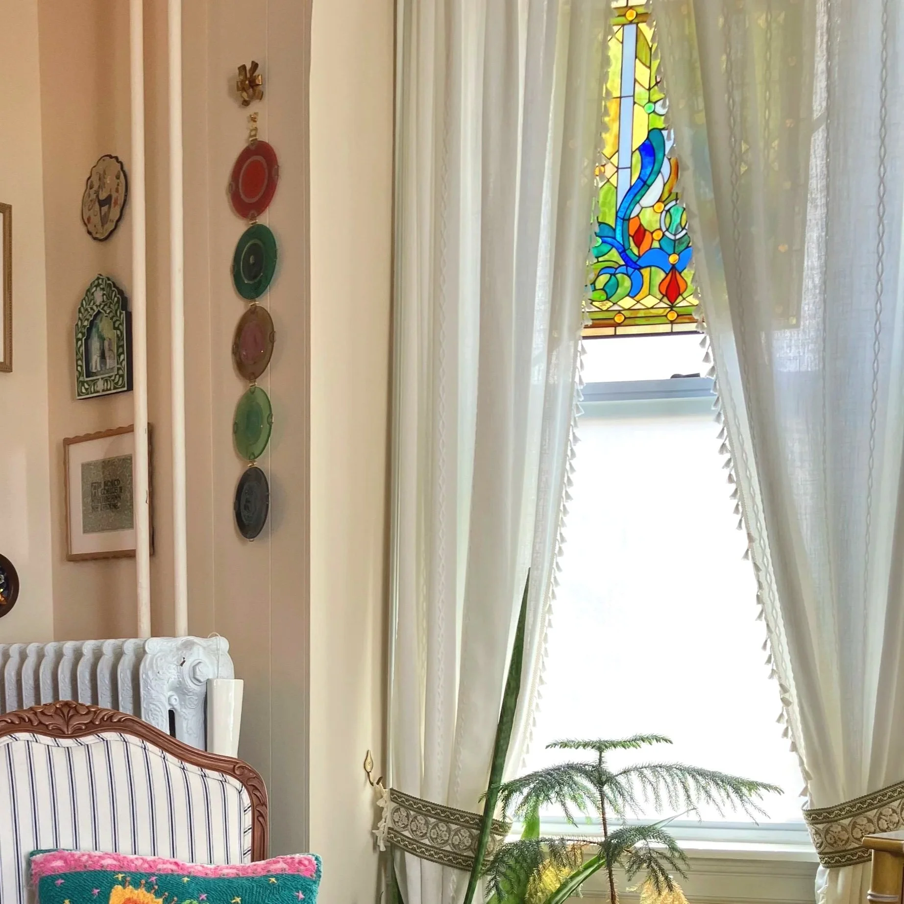 At the Main Line office of Meg Rogers, LMFT, stained glass hangs in the windows and privacy film is used on glass to create a light, calm, and colorful space for healing and growth. At Oak Grove Counseling, LLC, Meg Rogers, LMFT specializes in trauma