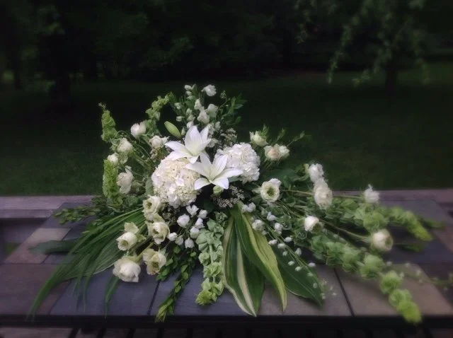 Whitecasketspray.jpg