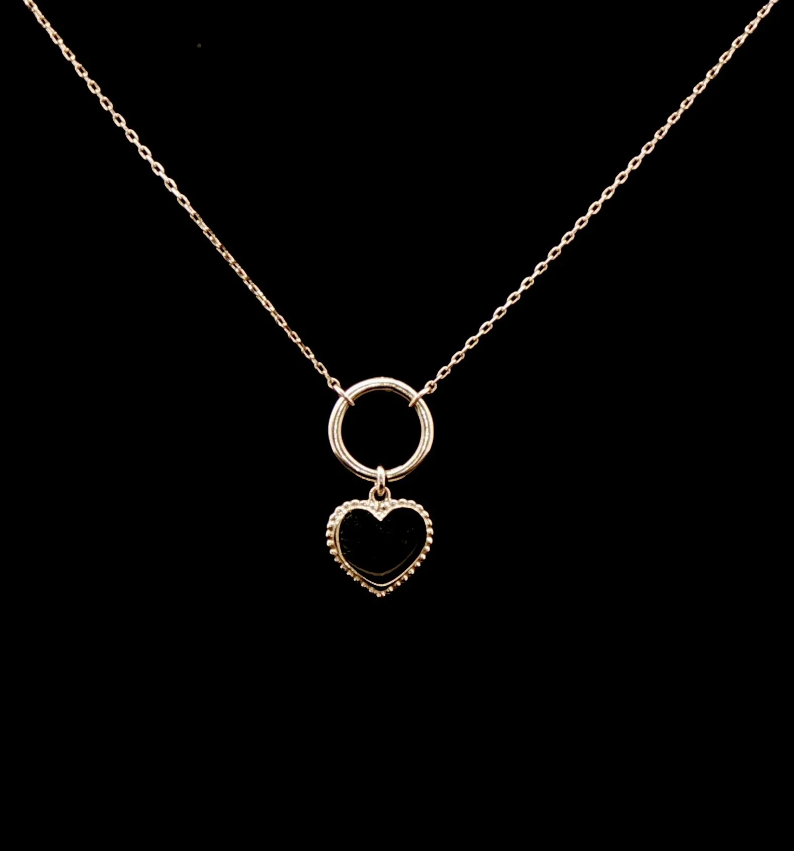 14k gold heart charm necklace worn on chain The Sparkle Bar Edmonton