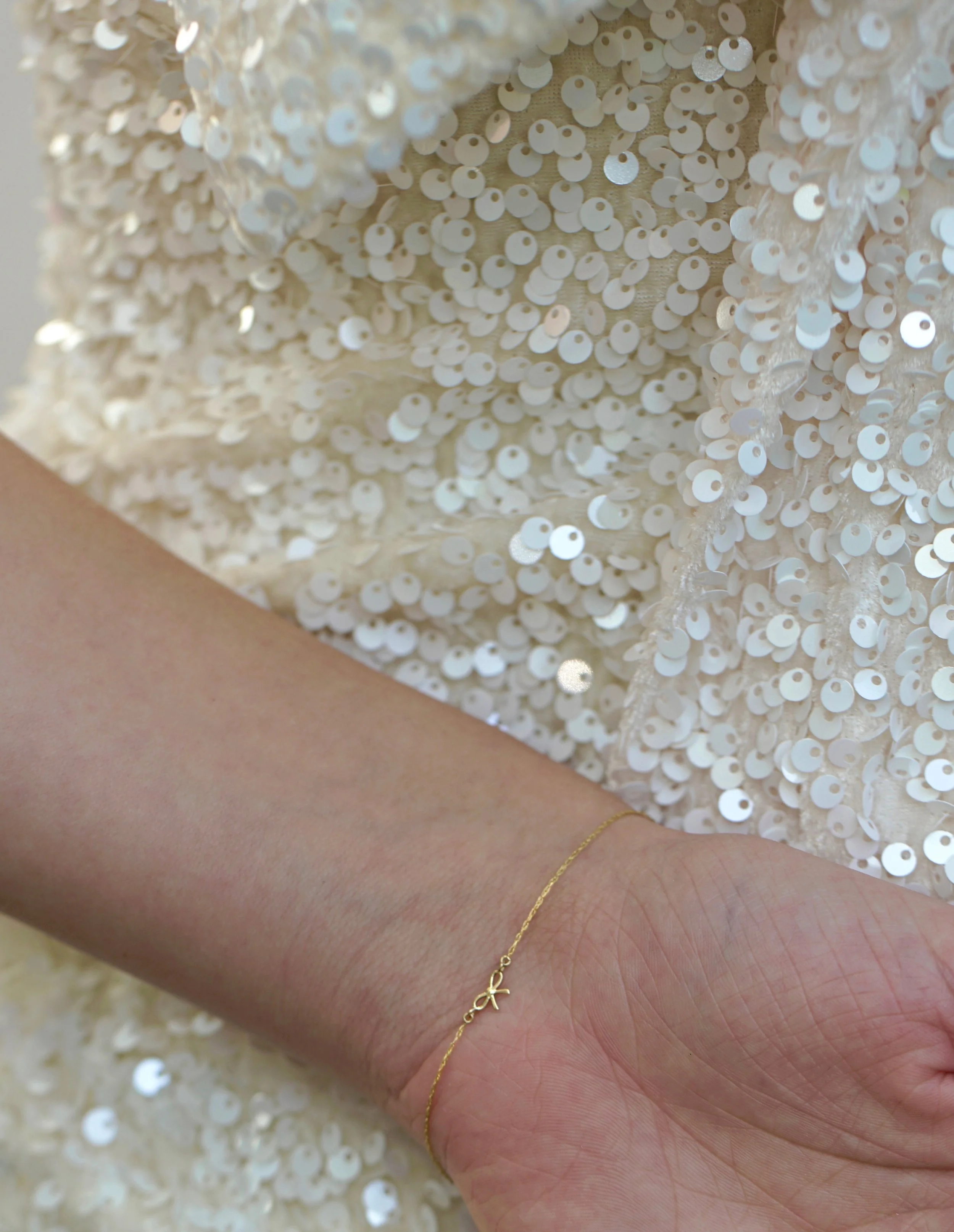 sweet-bow-bracelet-14k-the-sparkle-bar.jpeg