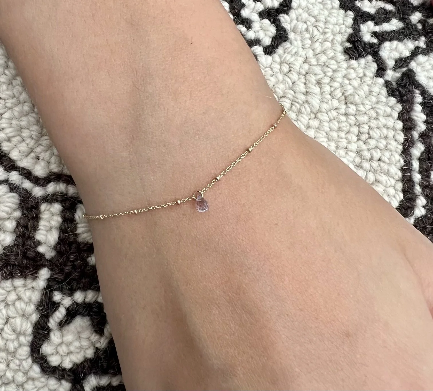 Solid Gold Satelite perament bracelet and lavender sapphire droplet from The Sparkle Bar.jpeg