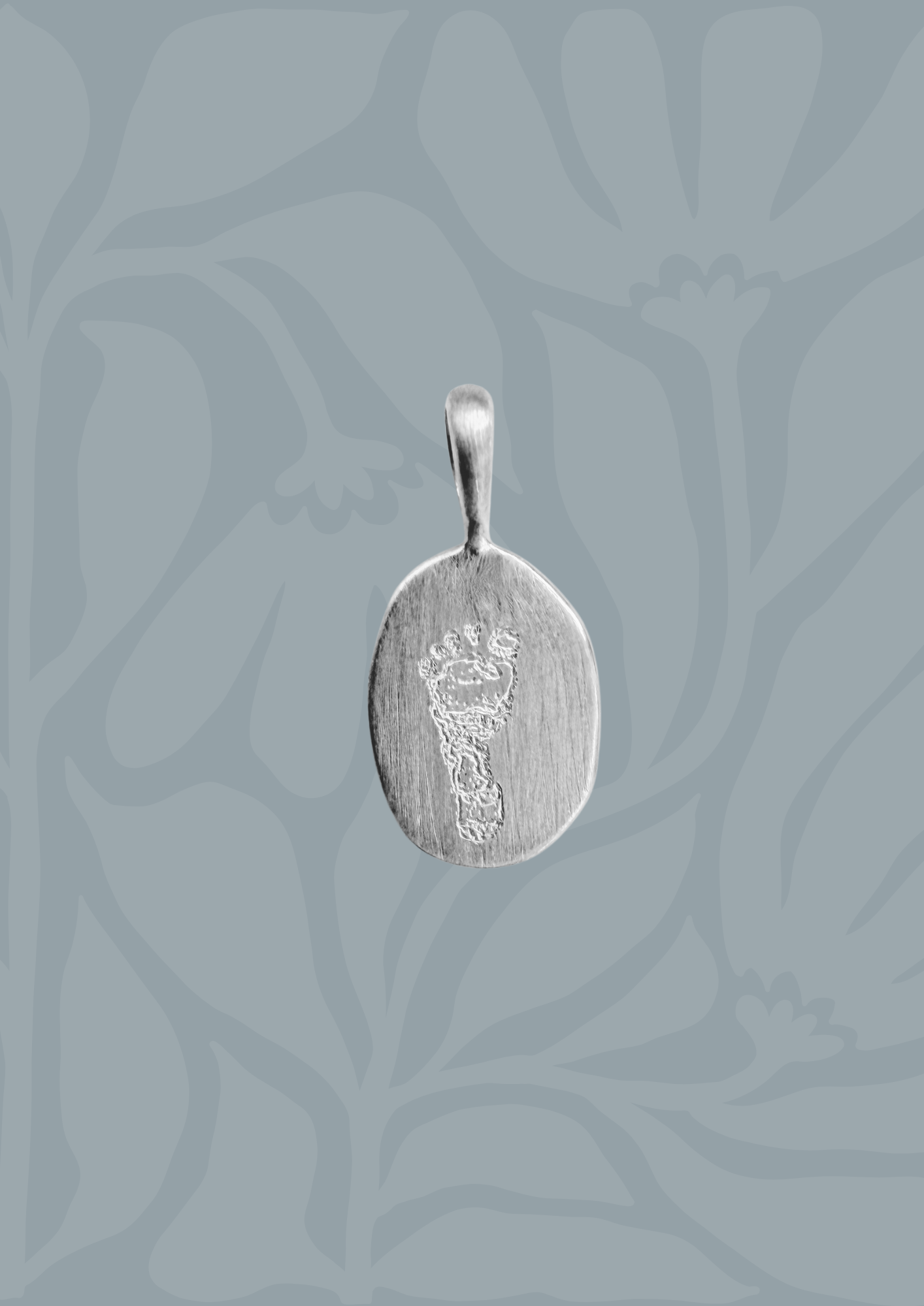 Sterling silver engravable oval charm with footprint engraving, personalized keepsake pendant