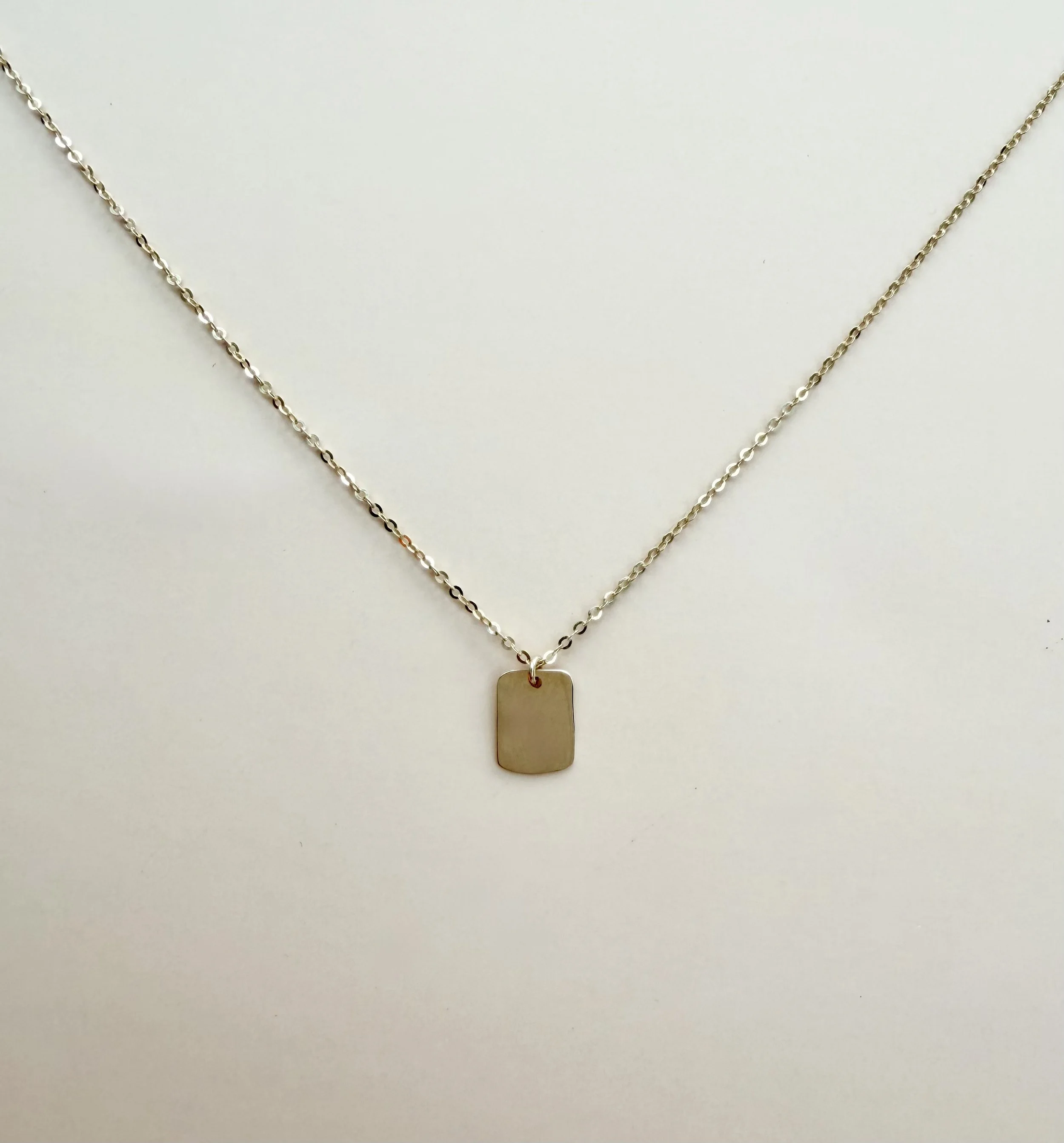 14k gold engravable Dreamer charm necklace on fine chain, small rectangular charm for custom engraving