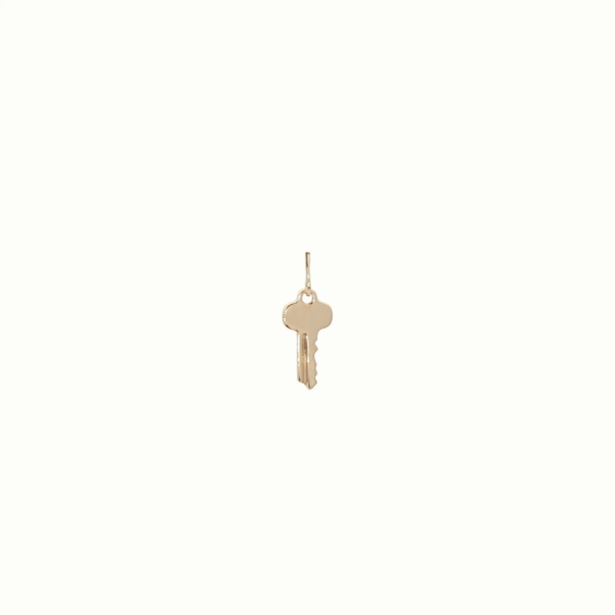 Tiny 14k gold key charm for custom engraving The Sparkle Bar Edmonton