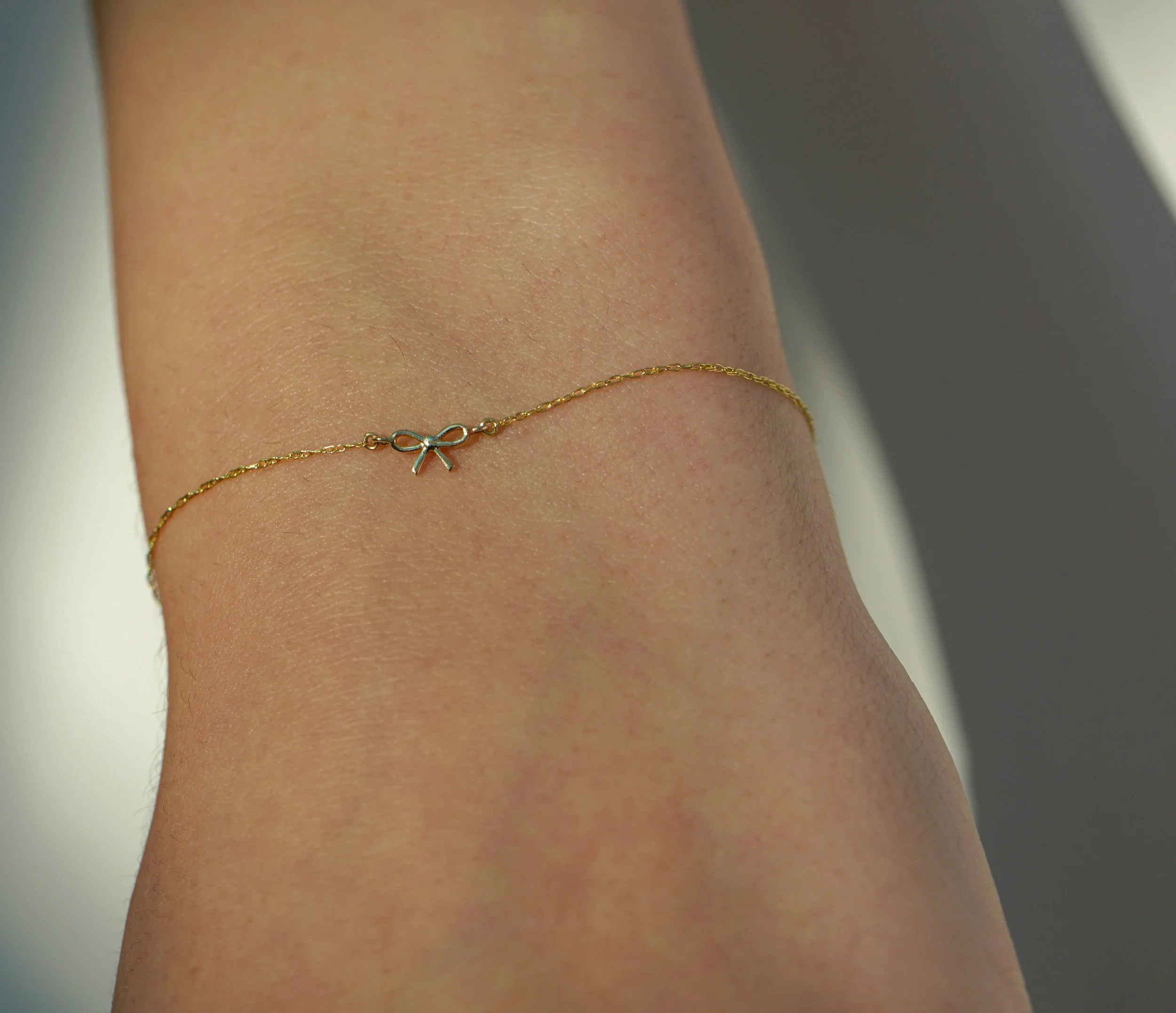 dainty-bow-connector-bracelet-the-sparkle-bar.jpg