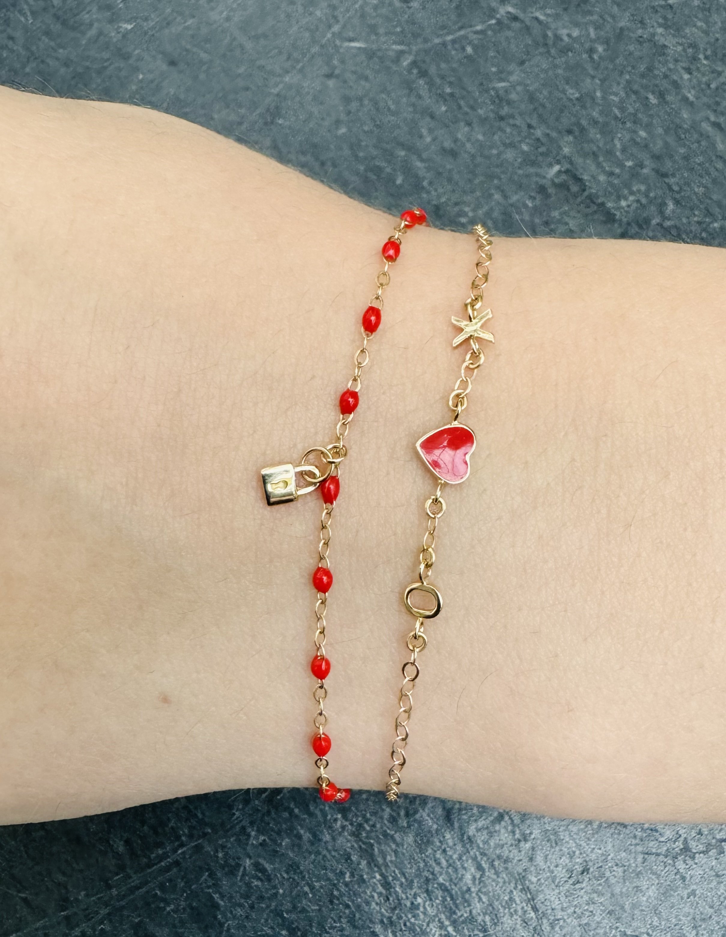 layered solid 14k red enamel bracelet with heart bracelet.jpeg