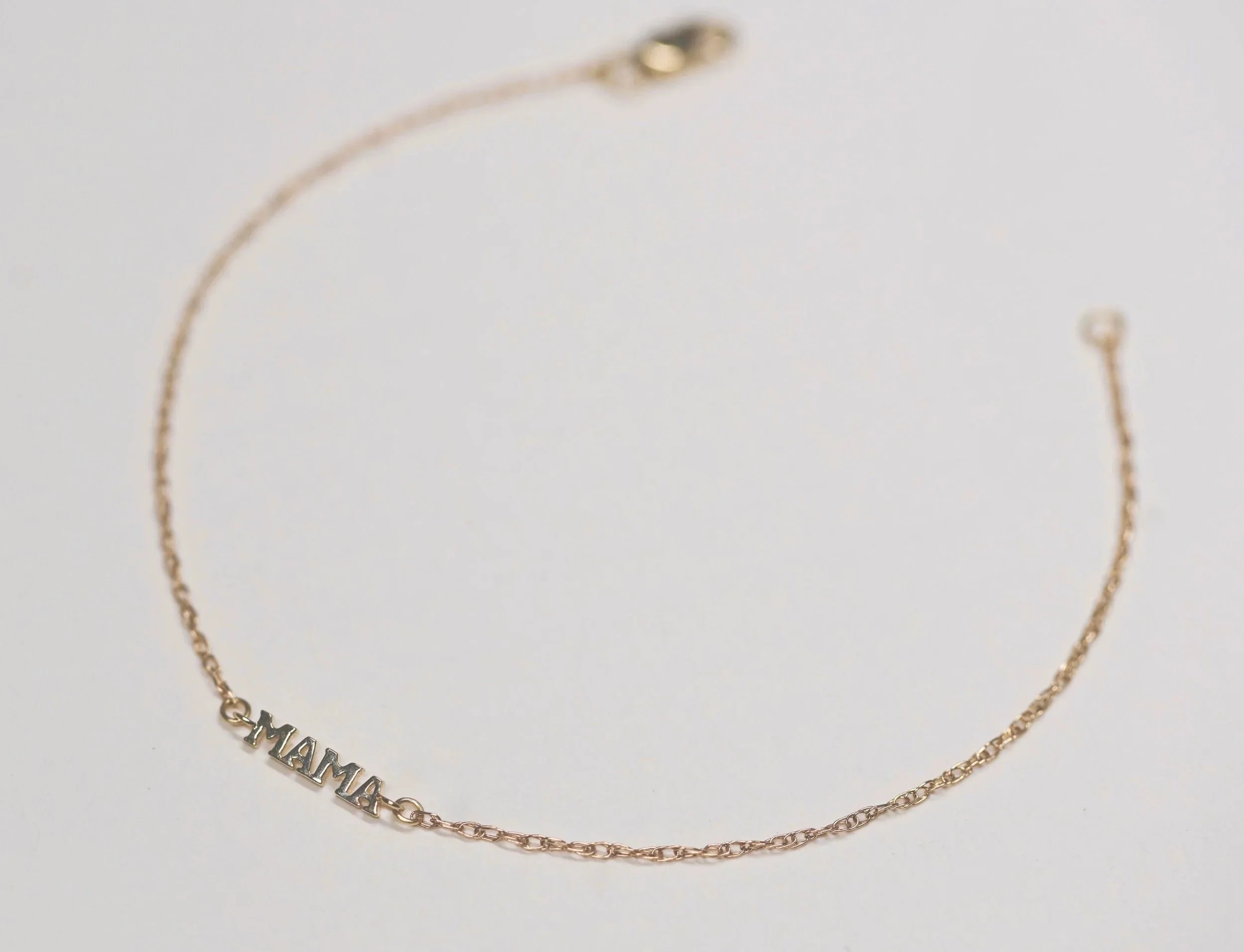 MAMA charm on a 14k gold cable chain for a permanent bracelet by The Sparkle Bar in Edmonton