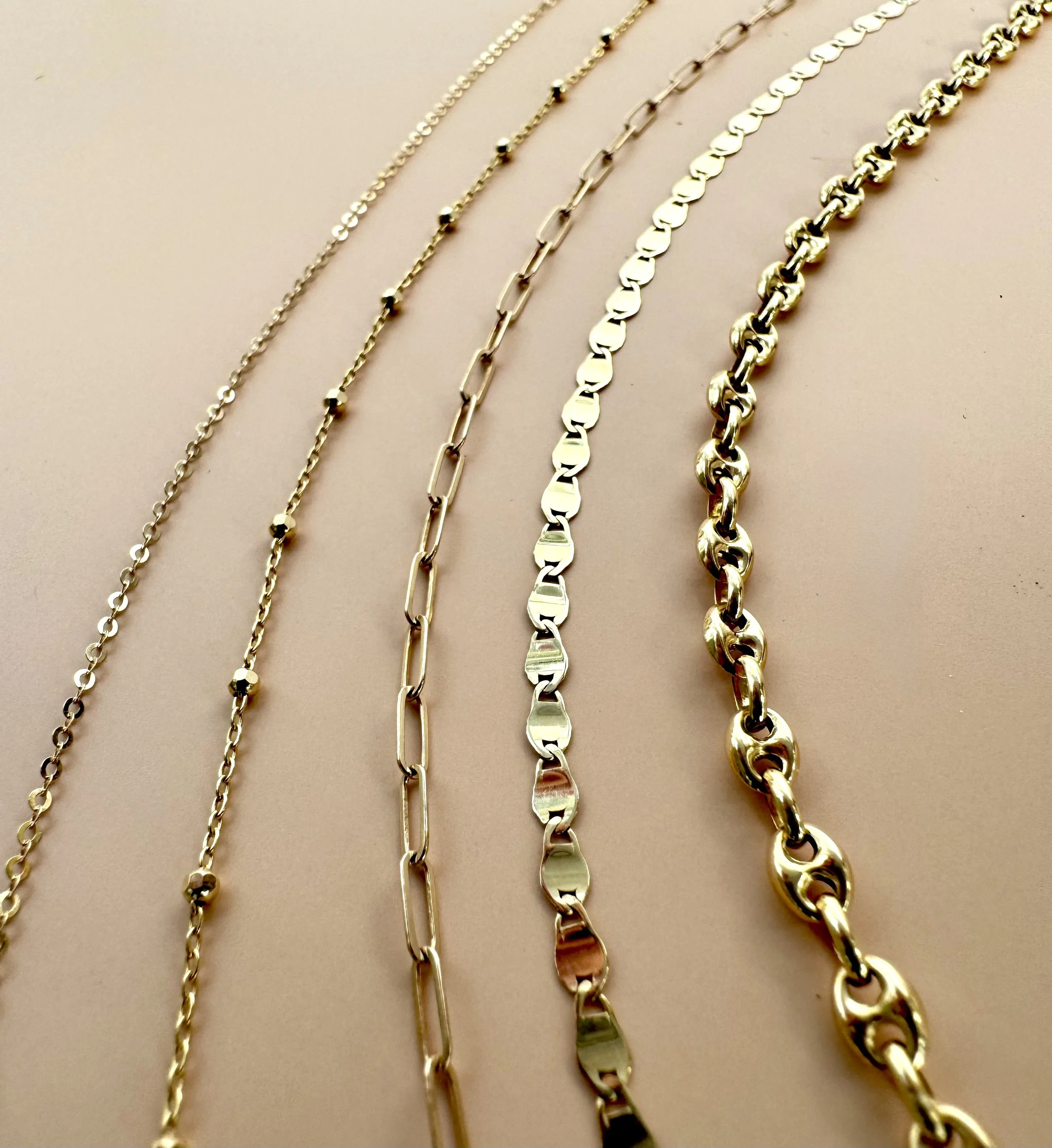 Solid 14k chains from The Sparkle Bar for permanent jewelry.