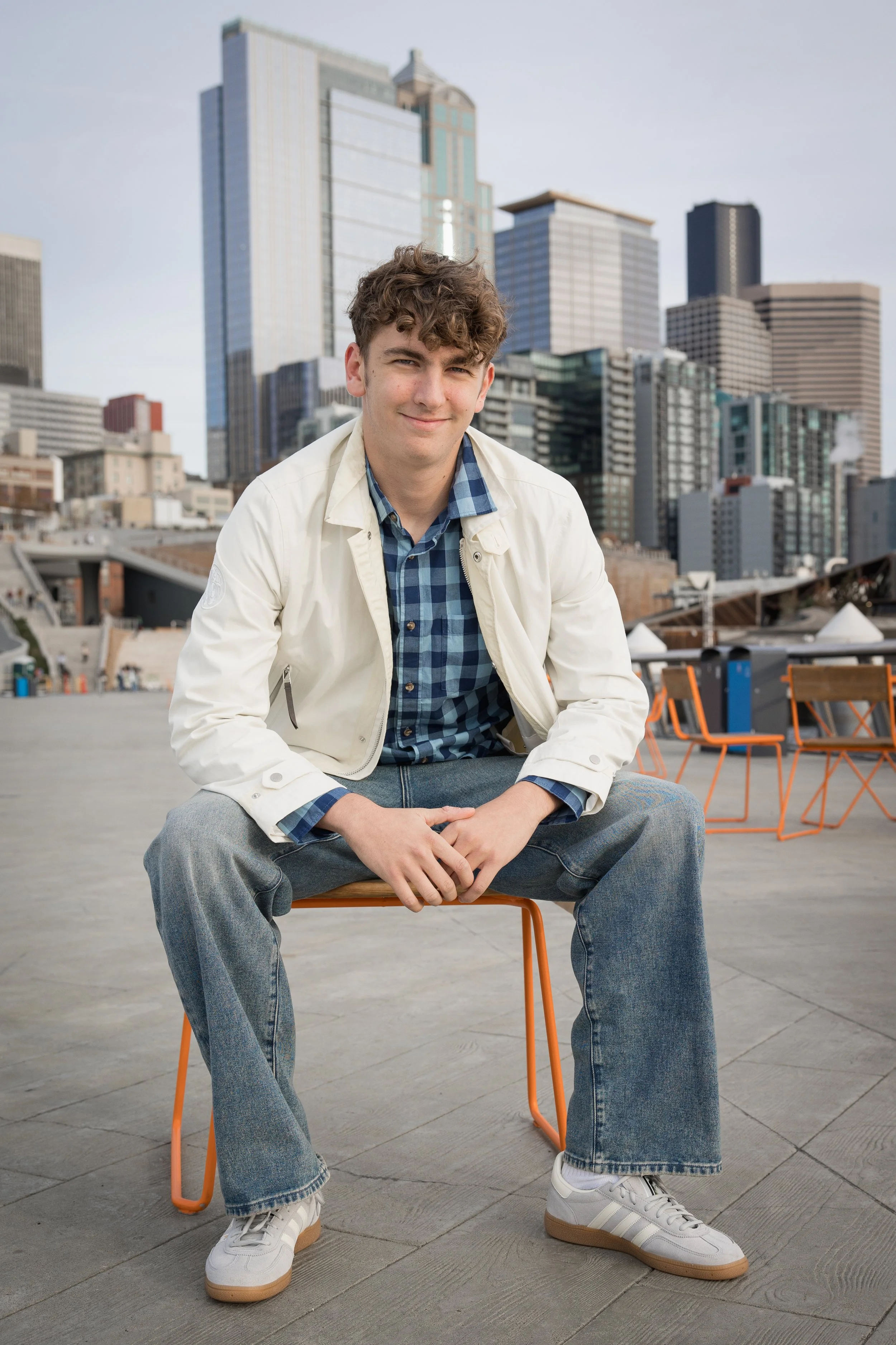 High school senior Guy in chair with Seattle