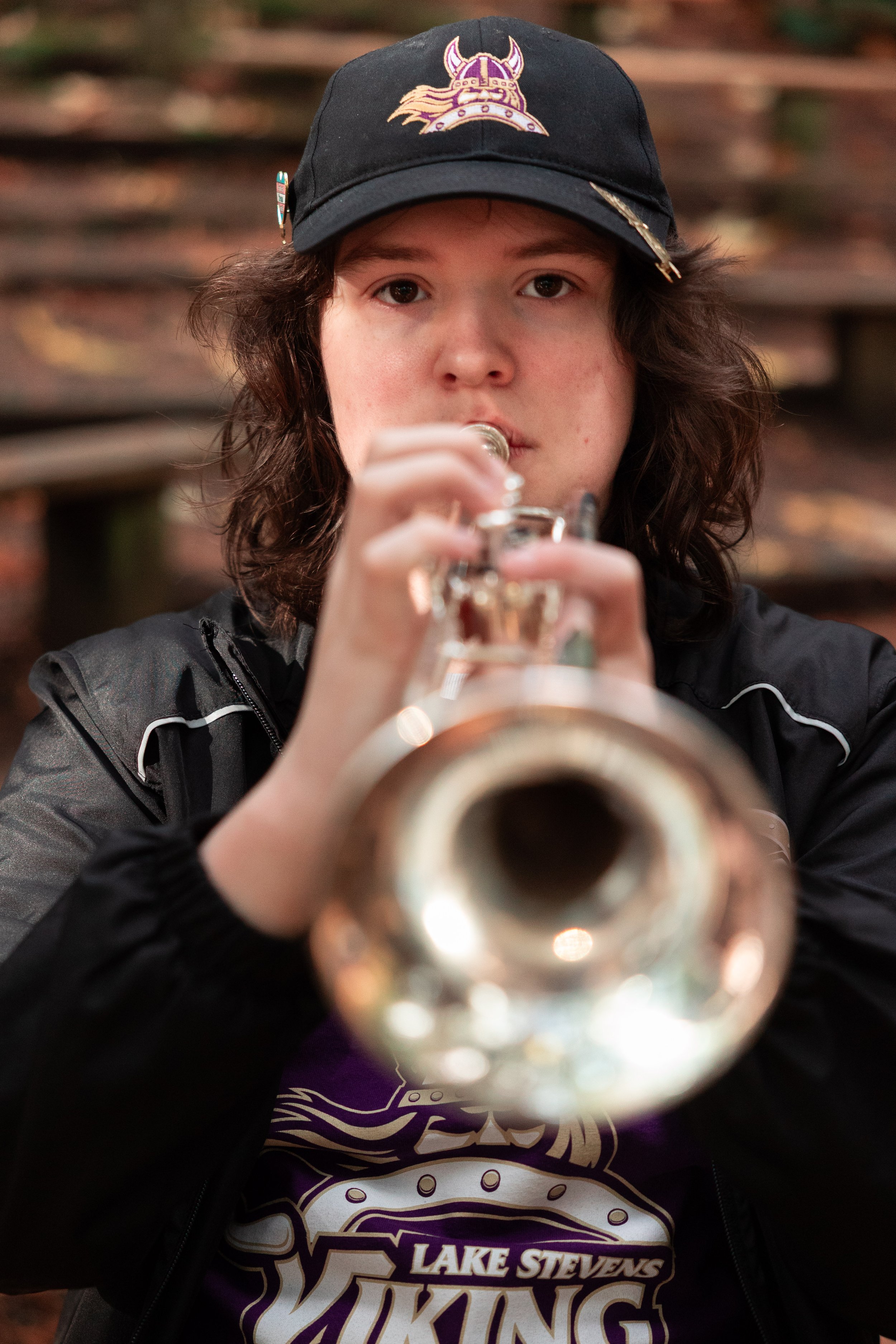 Lake Stevens Vikings High school senior playing instrument and looking at the camera for portraits