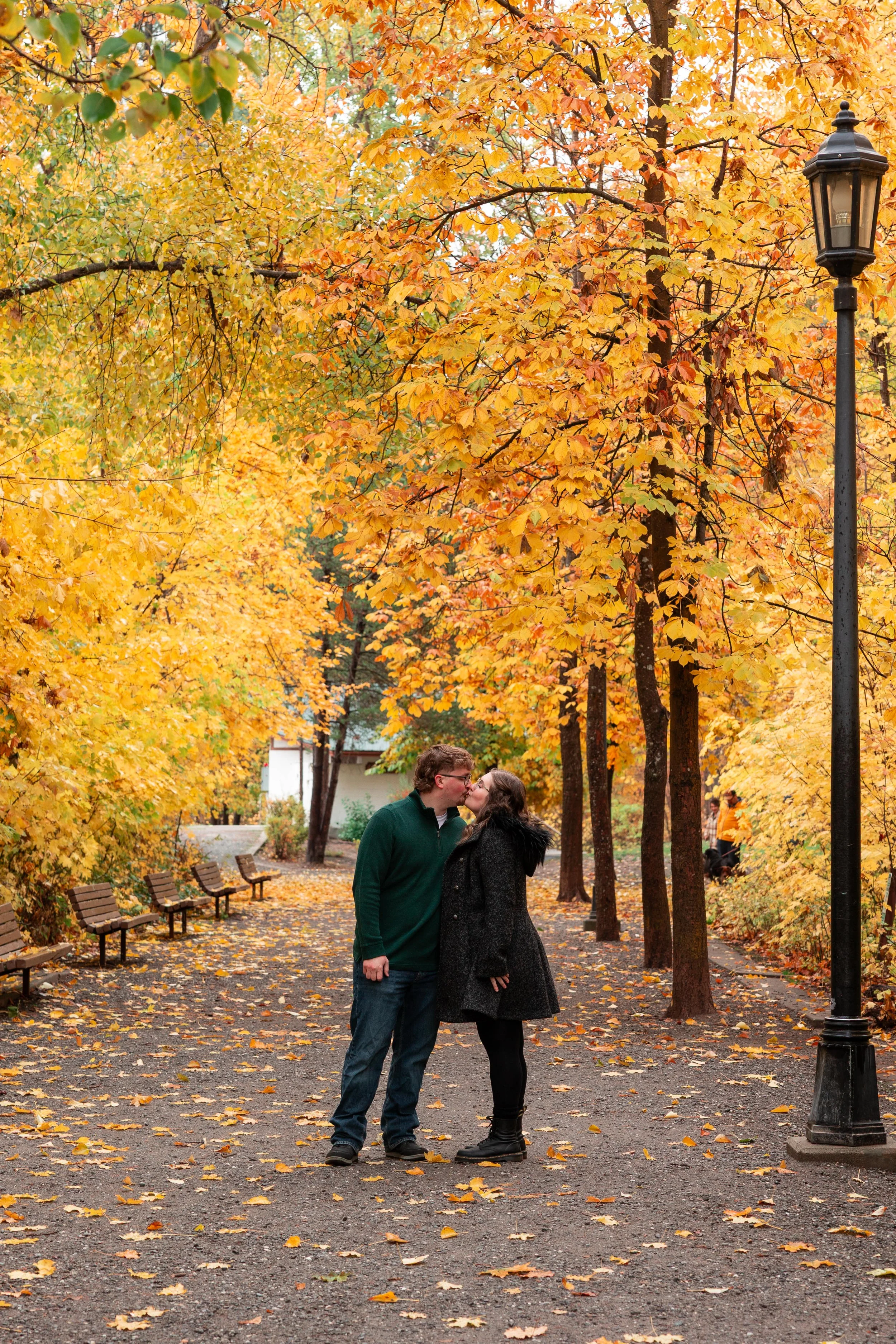 Couple portrait surrounded by fall colors in Leavenworth, WA