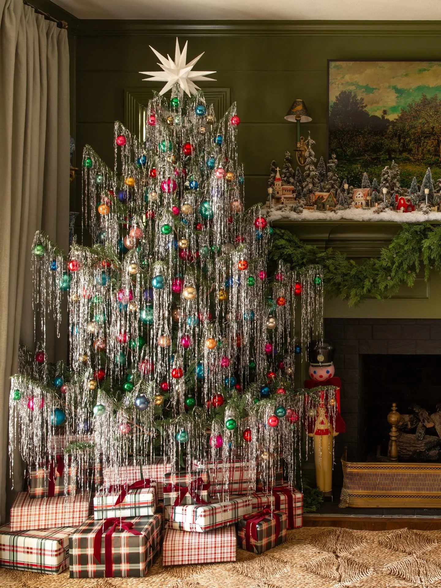 There is nothing quite as magical as a Christmas tree covered in vintage tinsel icicles. Simple Shiny Brite ornaments and plaid wrapped presents complete my vintage theme.

#vintageholiday #vintagechristmas #vintagetree #retrochristmas #vintagedecor 