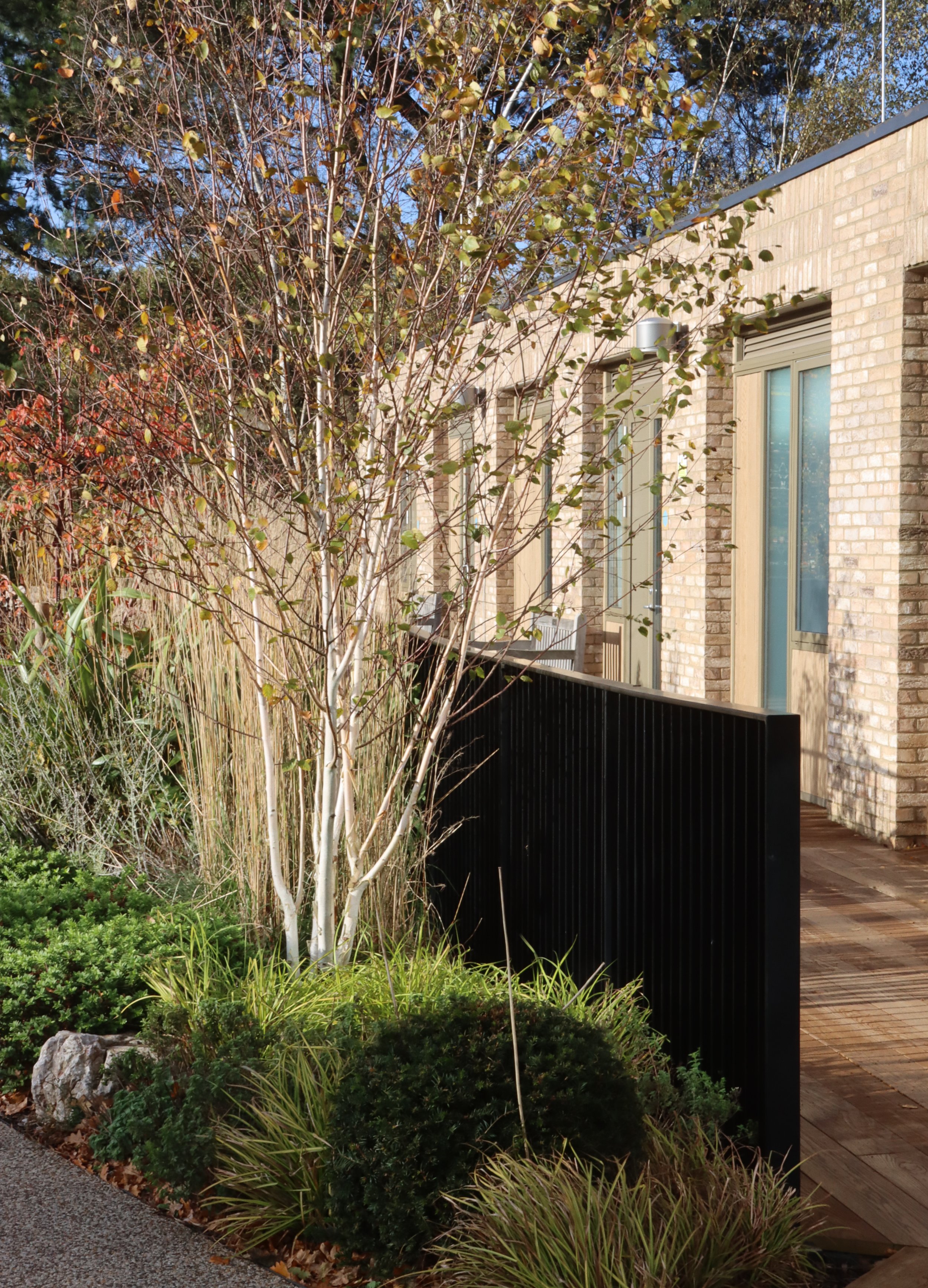 Bedroom wing opening out to landscape garden