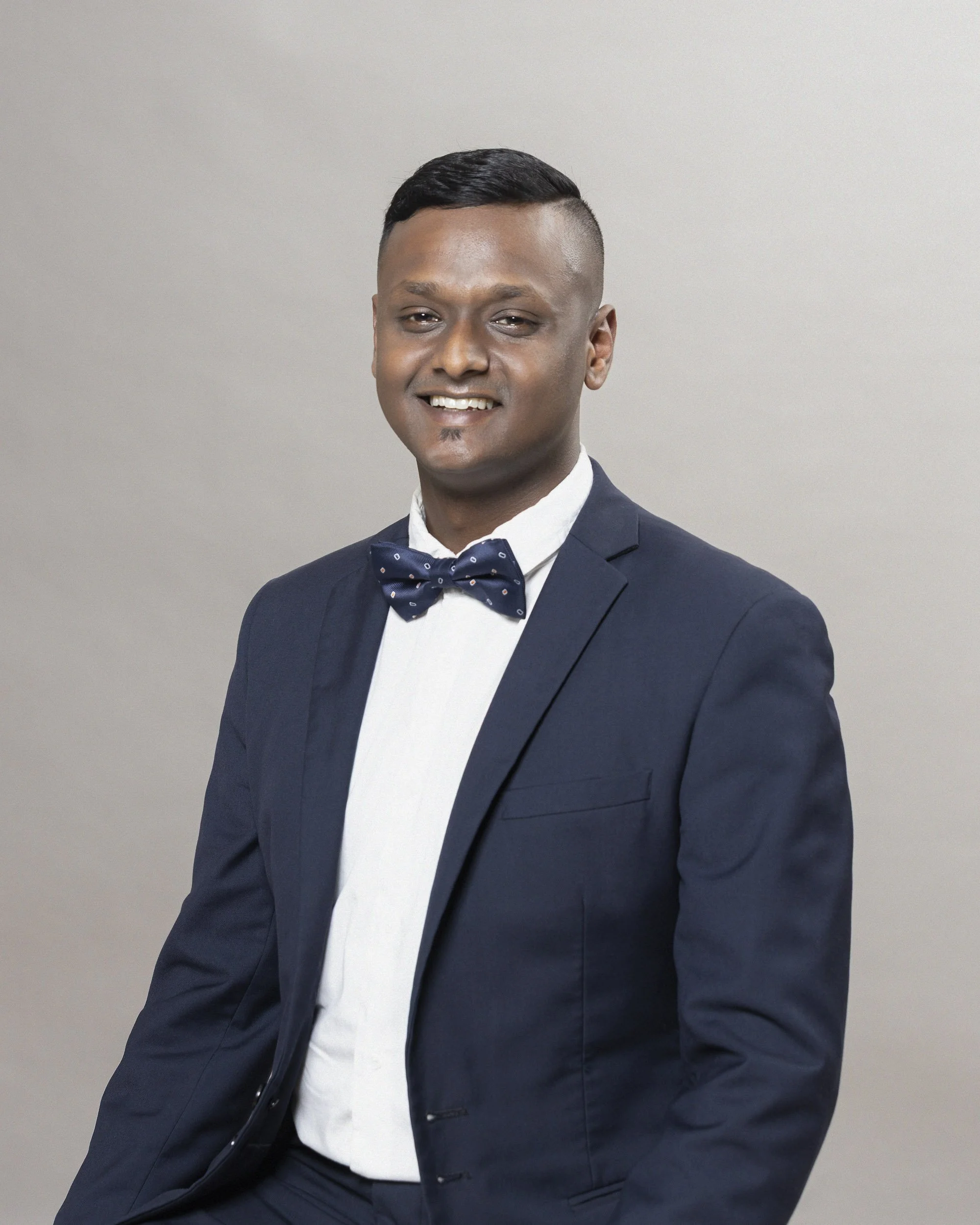 Keelan, Liberty Advisory Partner and Trusted Financial Advisor, Headshot Photograph done on Location with a portable studio setup at the Liberty offices in Canal Walk by Professional Headshot Portrait by photographer, Lauren Theunissen at Select Imag