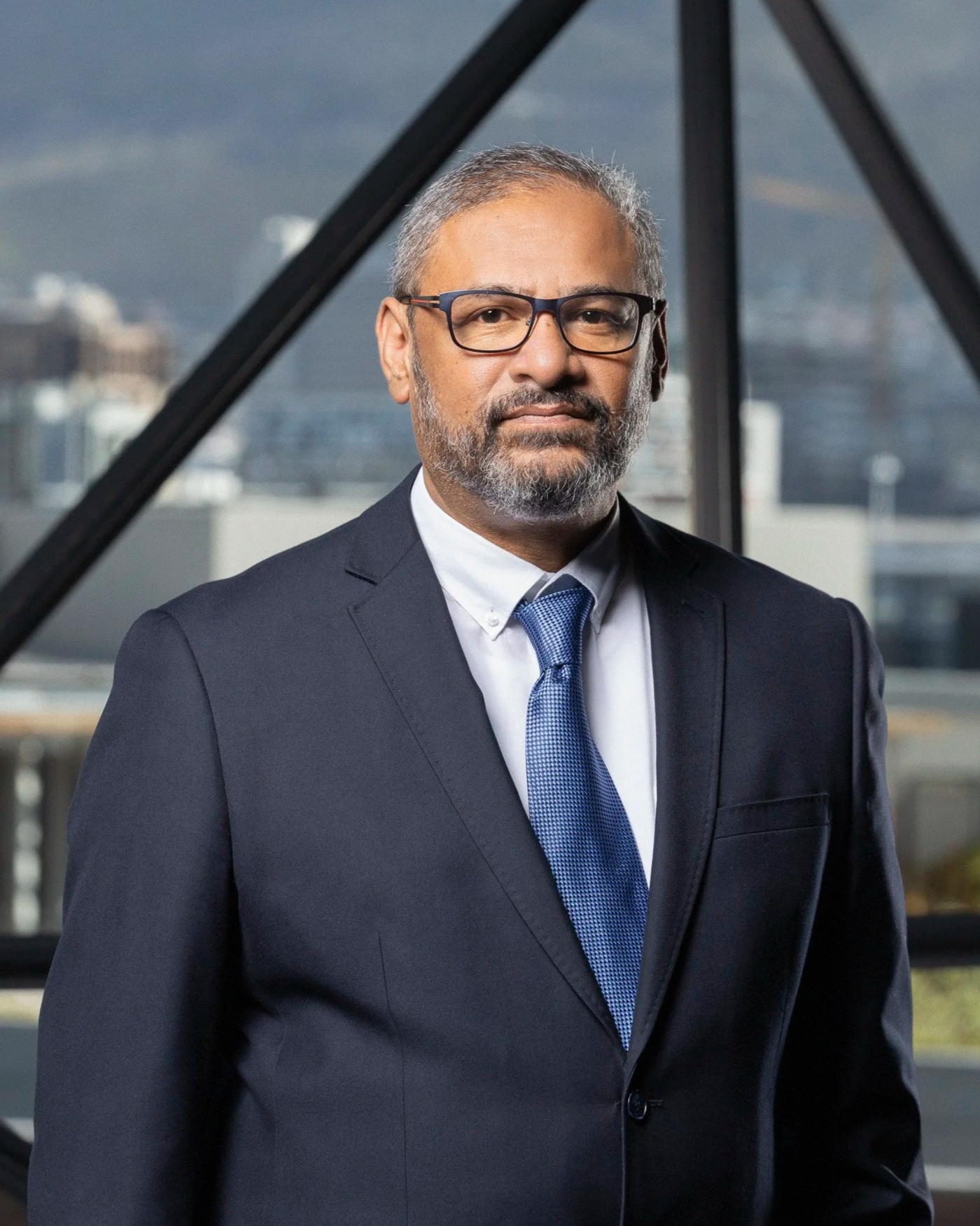 Fawaz Mustapha, Chief Operating Officer (COO), at Zeitz Museum of Contemporary Art Africa (MOCAA), Cape Town South Africa. . Headshot. Makeup:  Laura Mitchell Makeup. Lighting Assistant: Chriss Beukes, Photographer: Lauren Theunissen.   