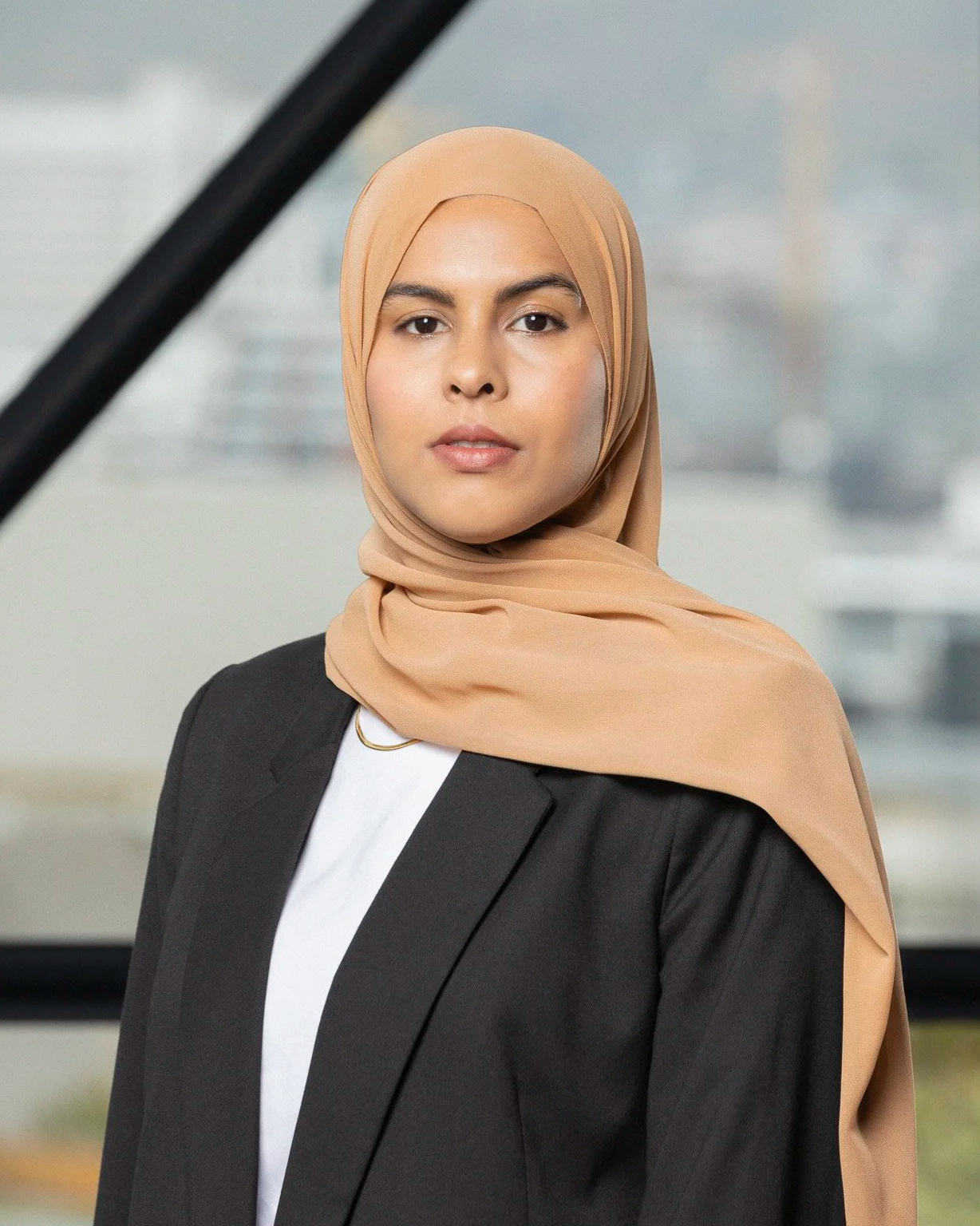 Tasneem Tarmahomed, Finance Manager at Zeitz Museum of Contemporary Art Africa (MOCAA), Cape Town South Africa. . Headshot. Makeup:  Laura Mitchell Makeup. Lighting Assistant: Chriss Beukes, Photographer: Lauren Theunissen.   