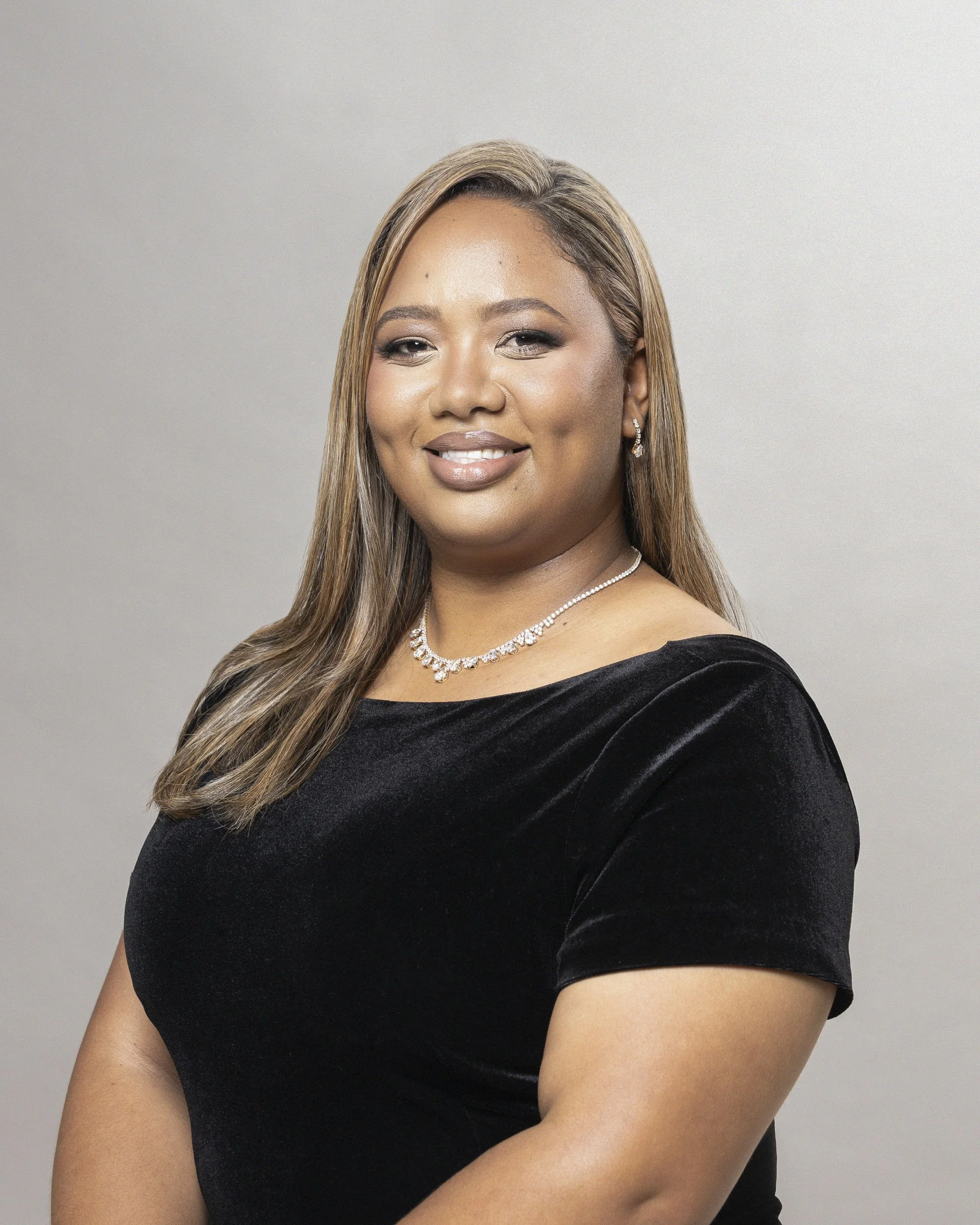 Maxine Muller, Liberty Advisory Partner and Trusted Financial Advisor, Headshot Photograph done on Location with a portable studio setup at the Liberty offices in Canal Walk by Professional Headshot Portrait by photographer, Lauren Theunissen at Sele