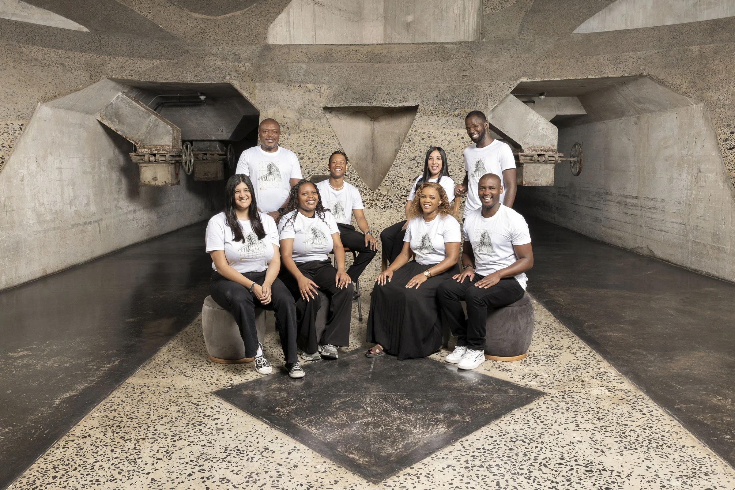 Front of House Team, Zeitz Museum of Contemporary Art Africa (MOCAA), Cape Town South Africa. . Headshot. Makeup:  Laura Mitchell Makeup. Lighting Assistant: Chriss Beukes, Photographer: Lauren Theunissen.  