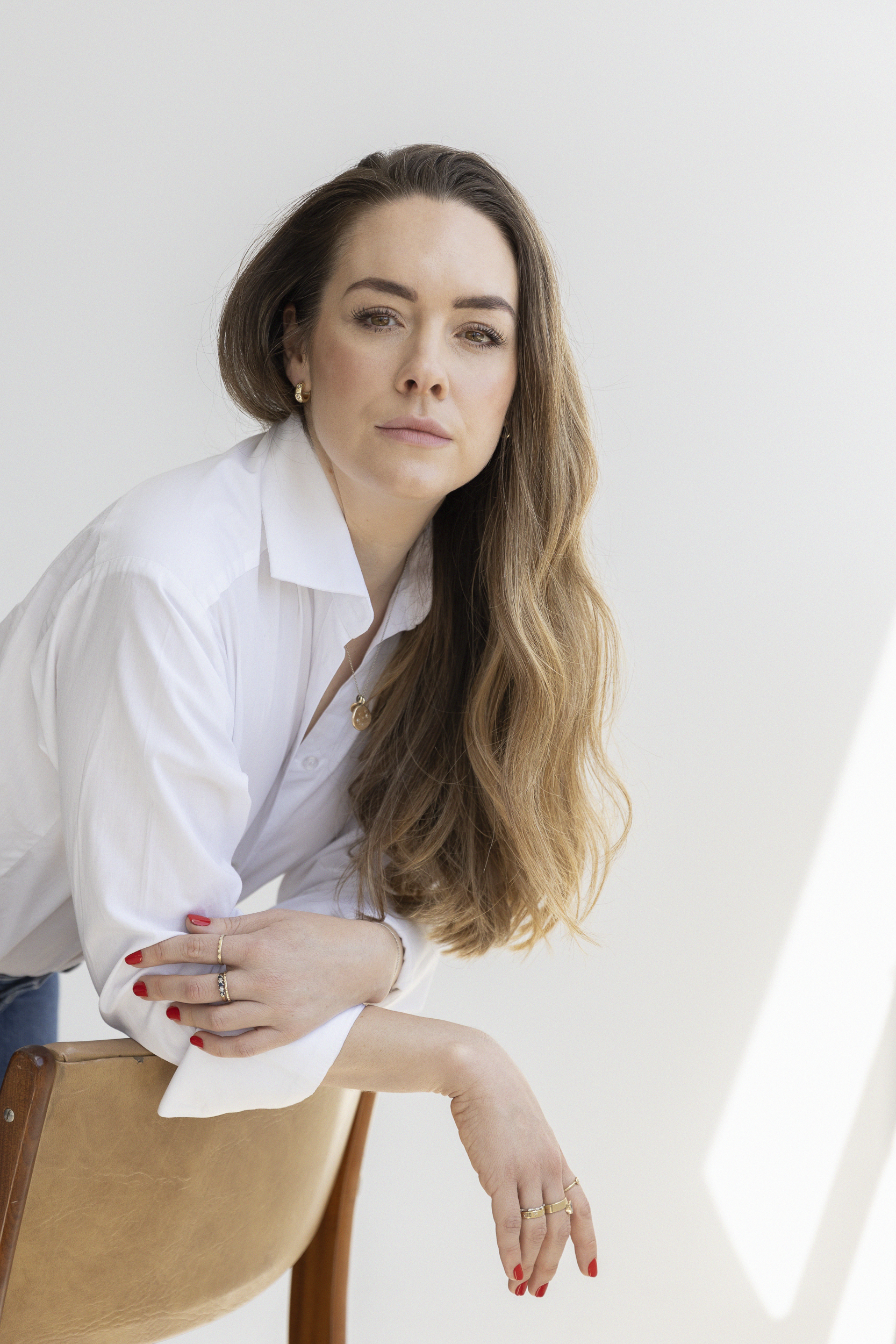 Laura Mitchell, professional  Makeup and Hairstylist, Cape Town, South Africa, Natural light Studio Photography, Headshot Portrait and  Personal Branding shoot . Black shirt and black jeans. @lauramitchell_makeup_hair