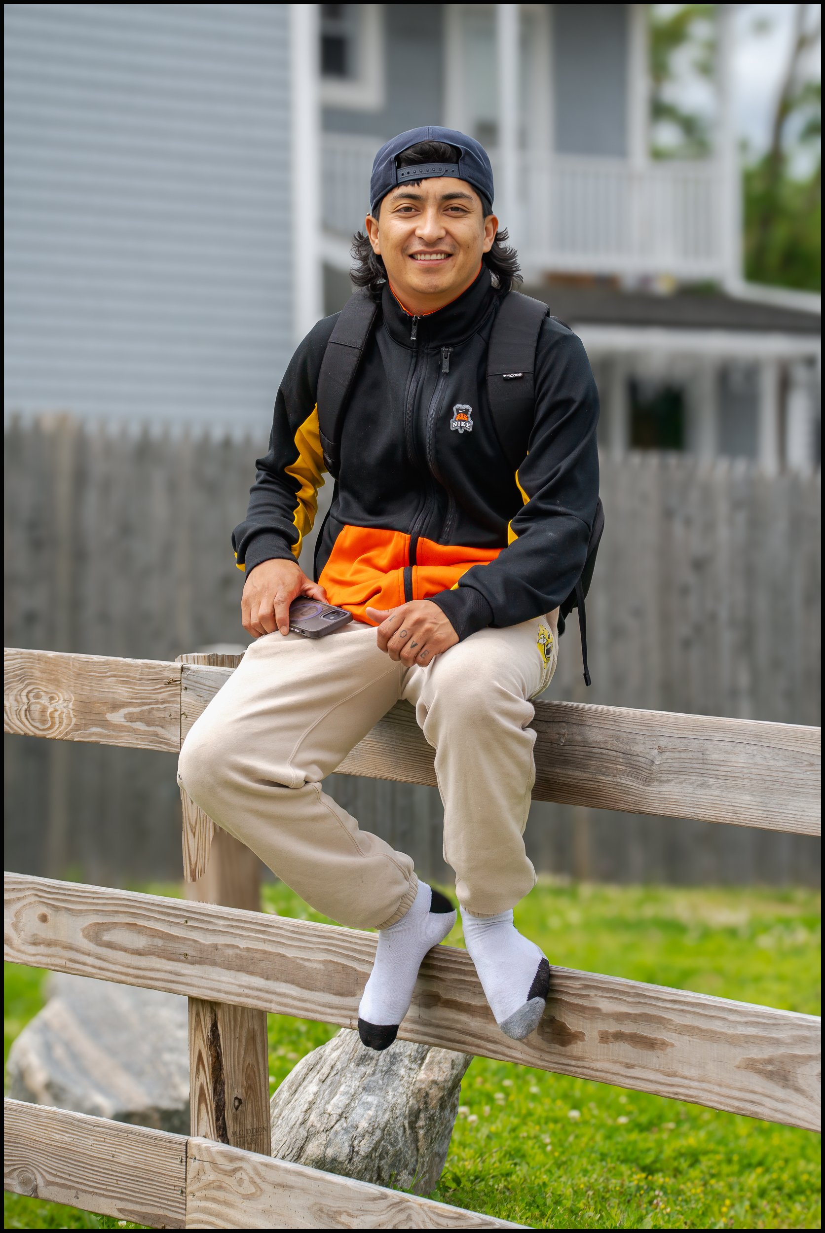 Man on a Fence.  Ossining, June 1, 2025