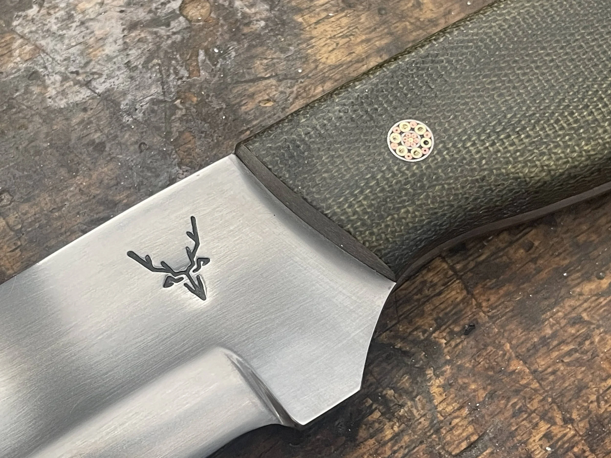 Bushman Green Micarta Facing Left