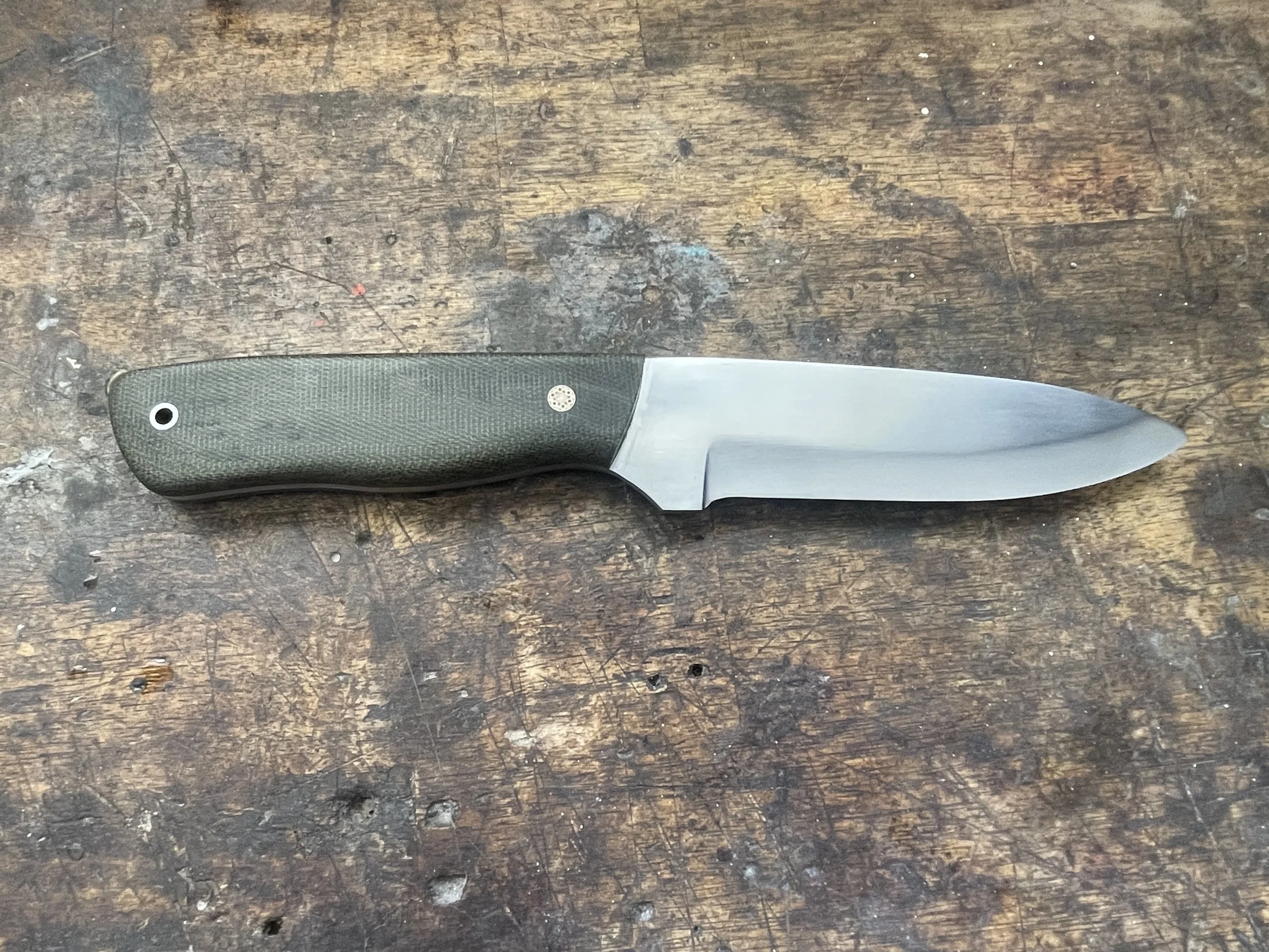Bushman Green Micarta Facing Right