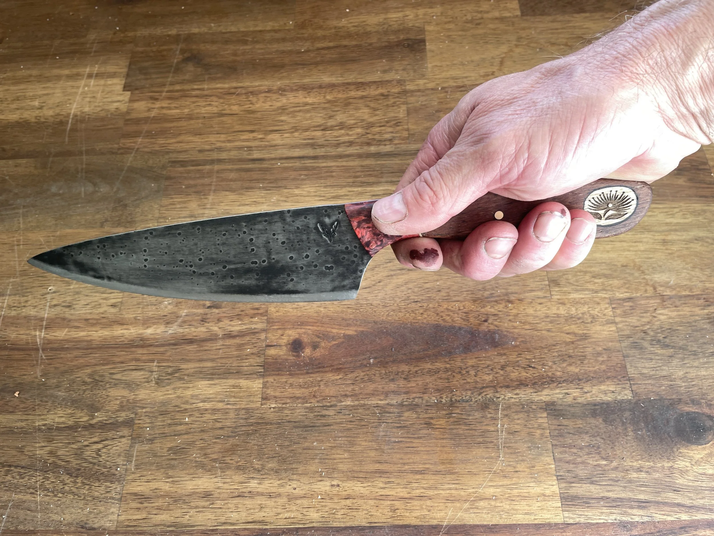 Tribute to Pohutukawa Chef Knife in the hand