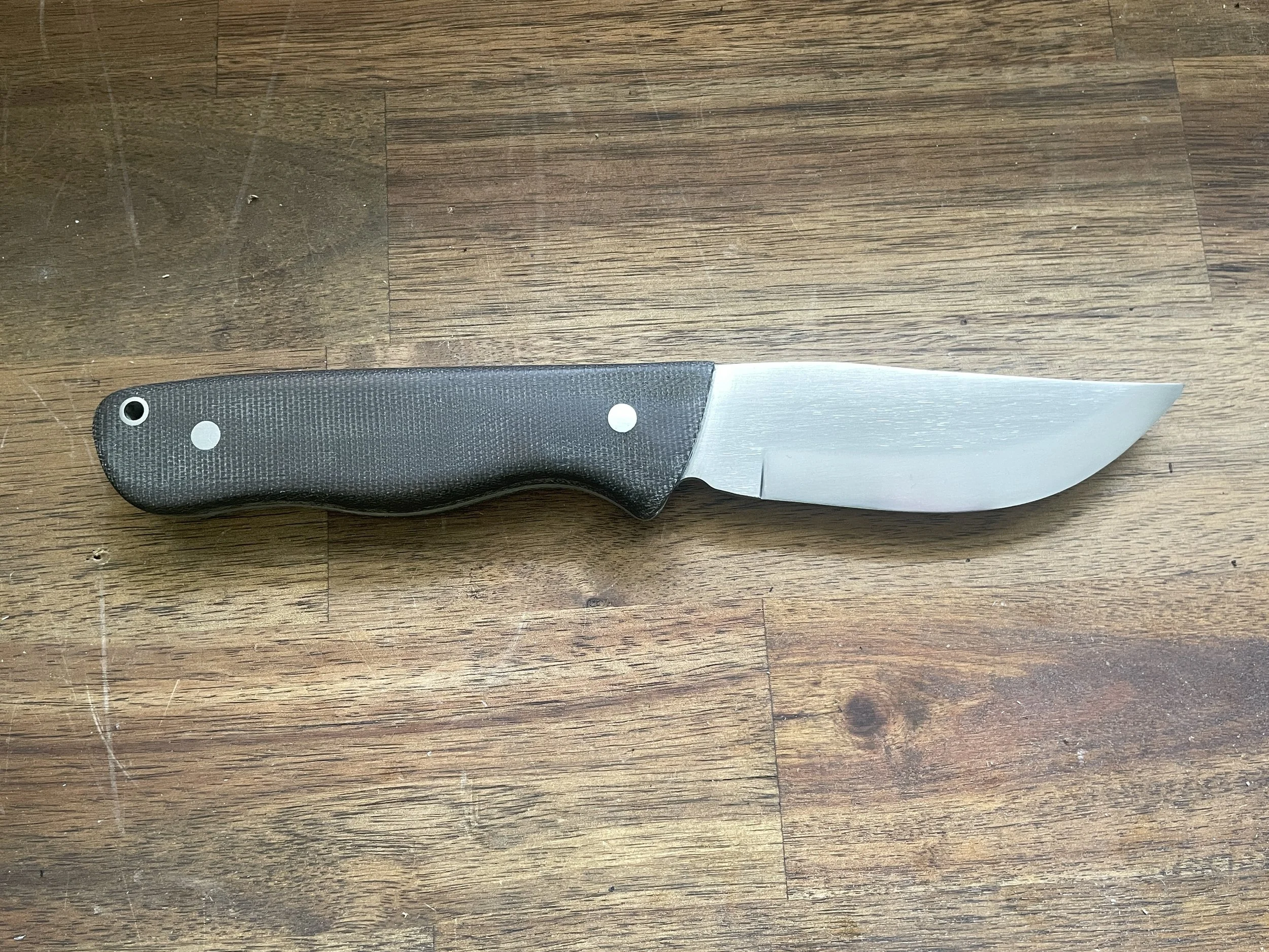 Ultimate Hunter Knife with Olive Micarta Handle facing right