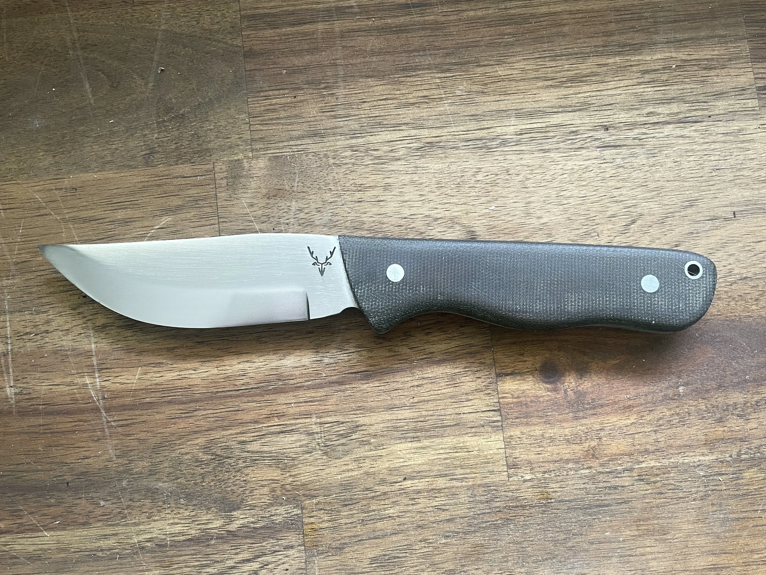 Ultimate Hunter Knife with Olive Micarta Handle facing left