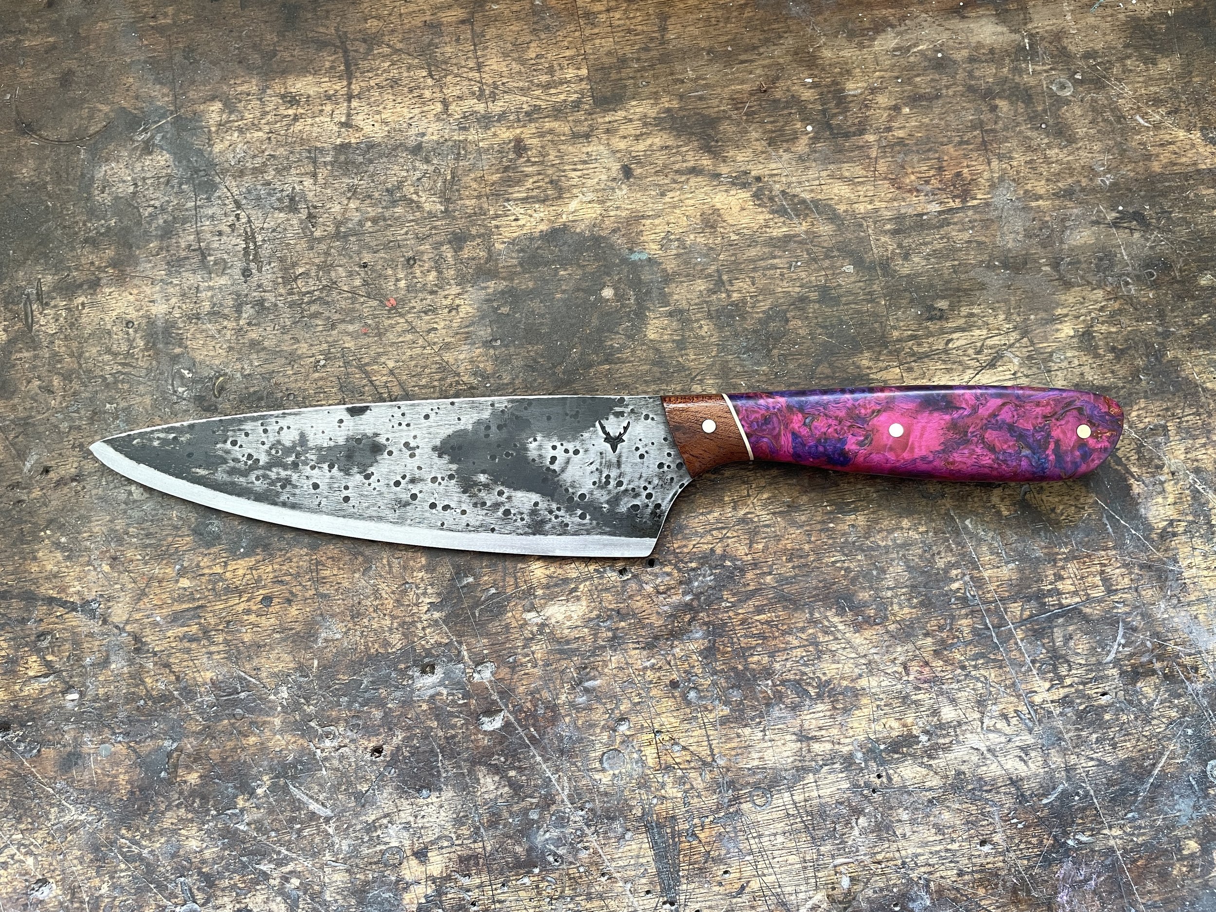 7 inch chef knife facing left
