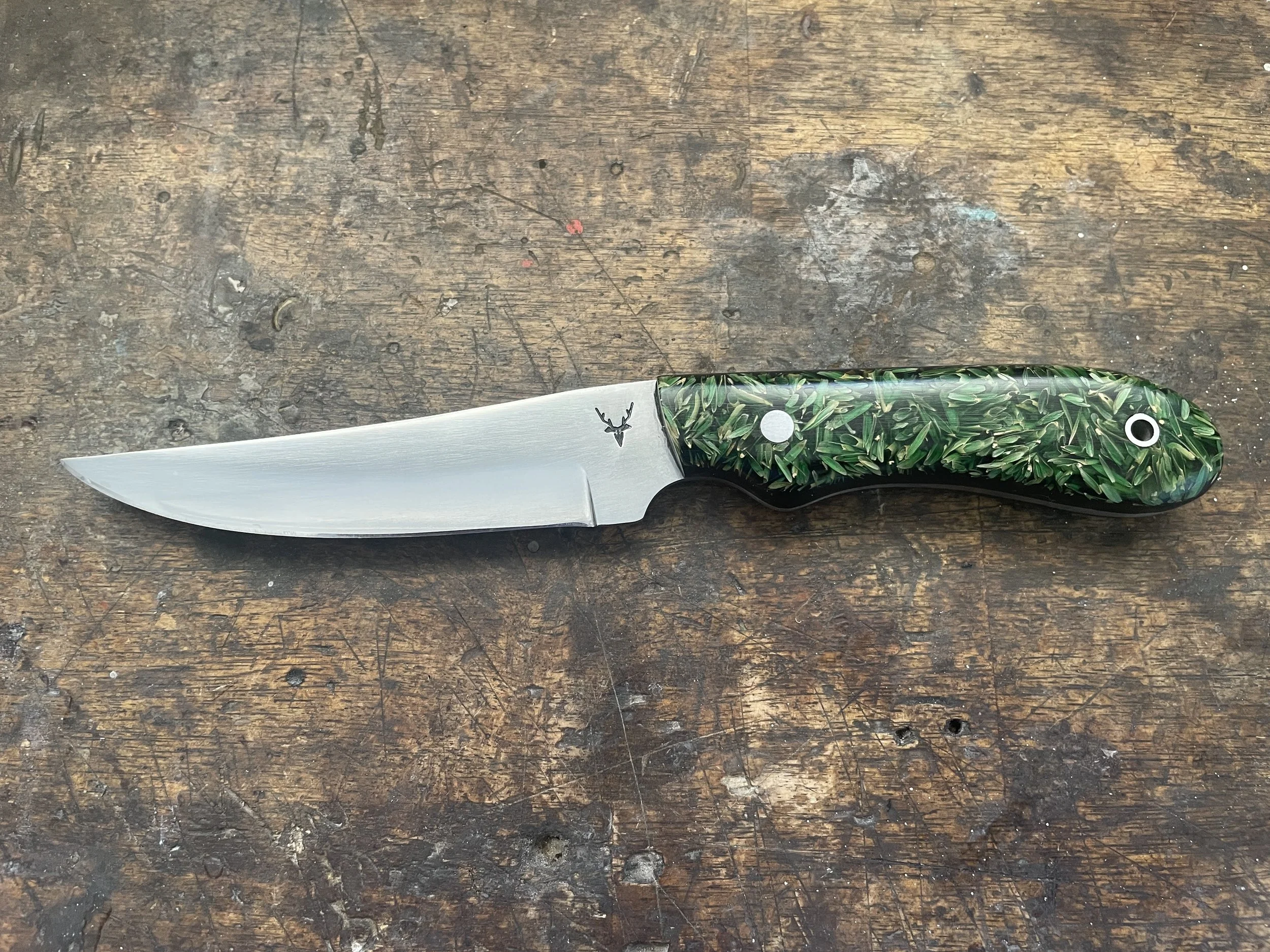 Bird & Trout green rice husk facing left