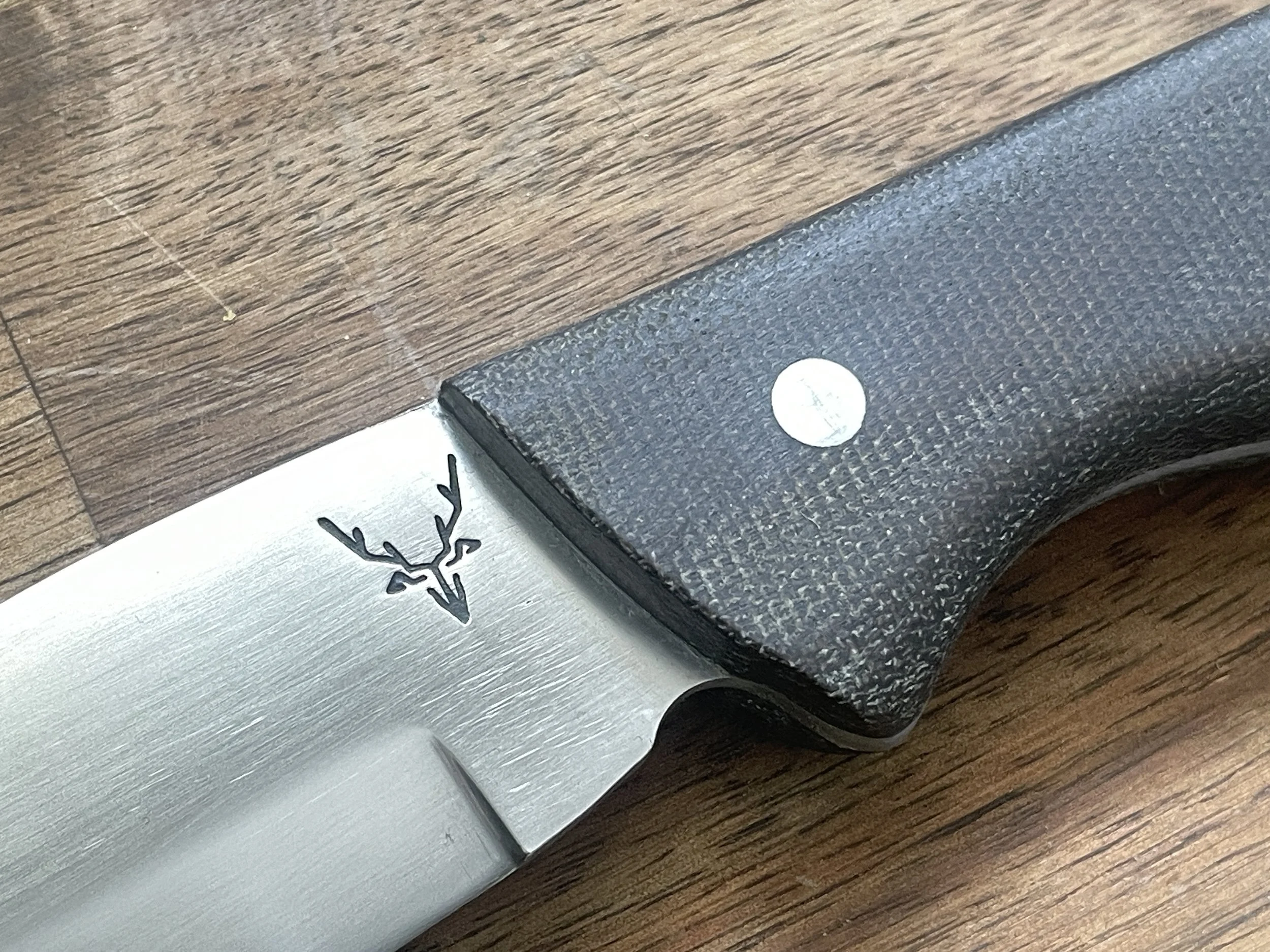 Ultimate Hunter Knife with Olive Micarta Handle close up