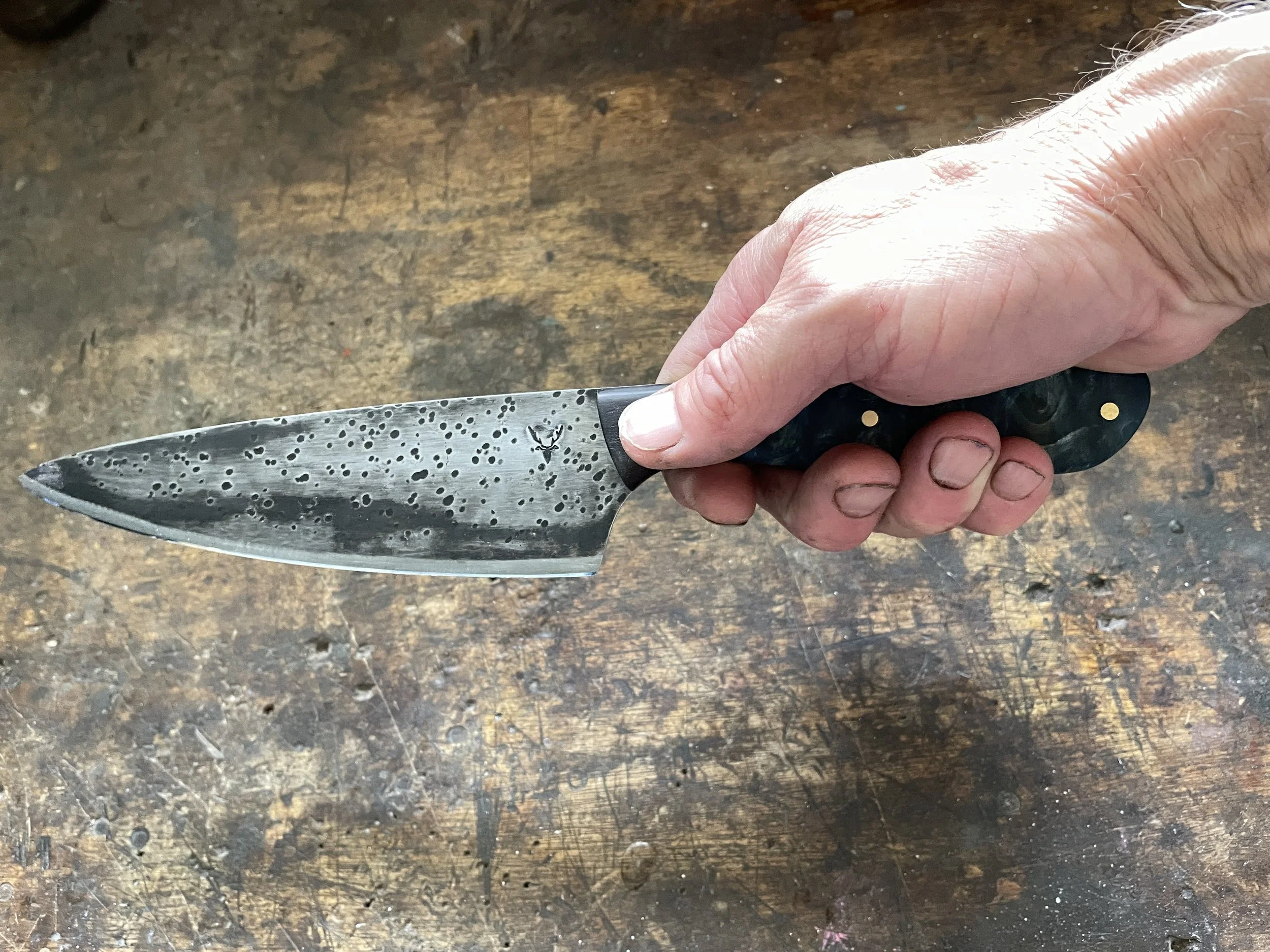 7 inch chef knife in the hand