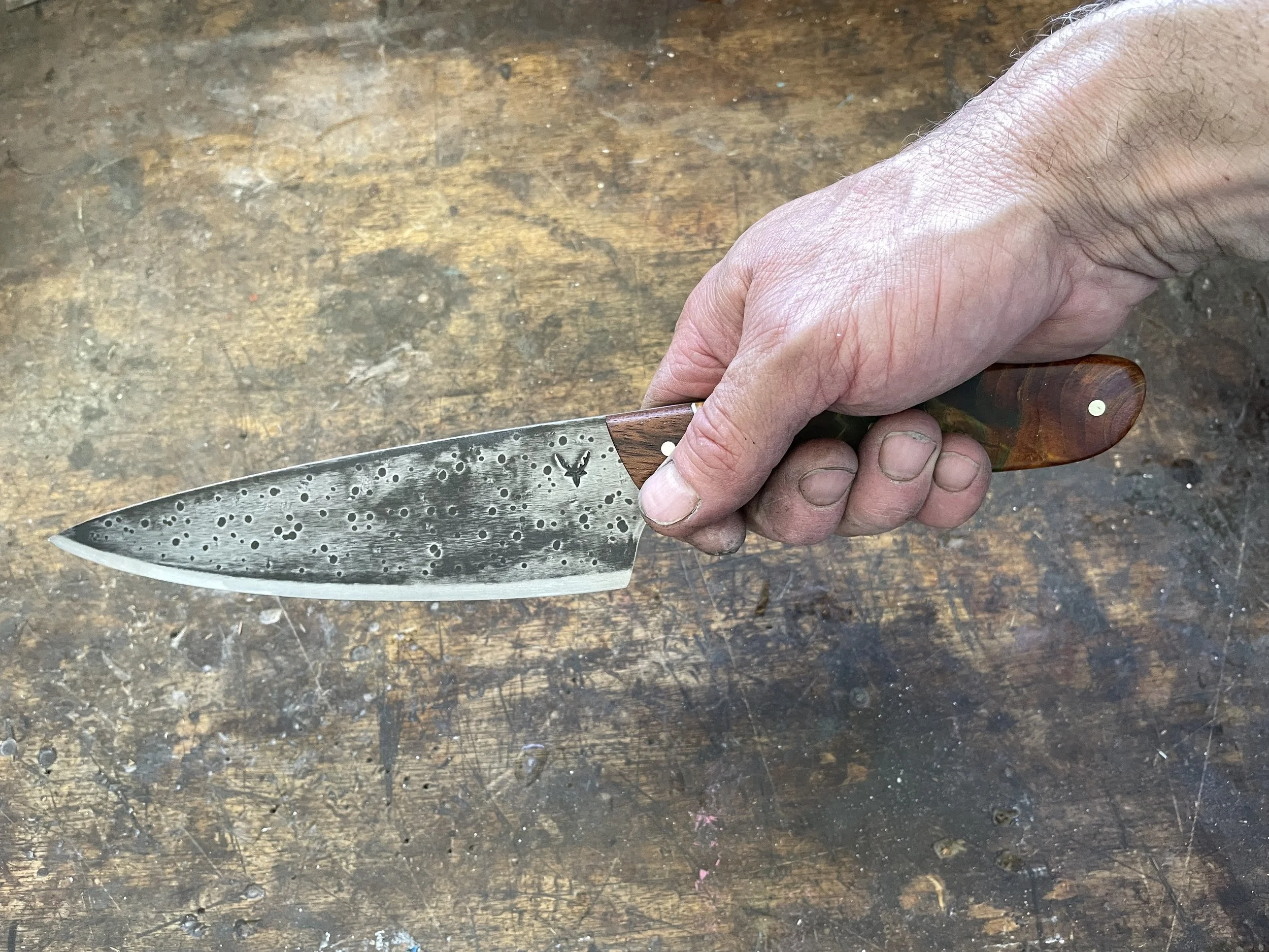 Curly Birch Green & Brown Chef Knife in the hand